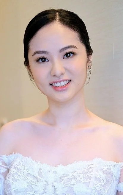 Classic Bridal Elegance
Timeless bridal makeup featuring defined eyes, sculpted cheeks, and a soft nude lip, creating an elegant and sophisticated wedding look.