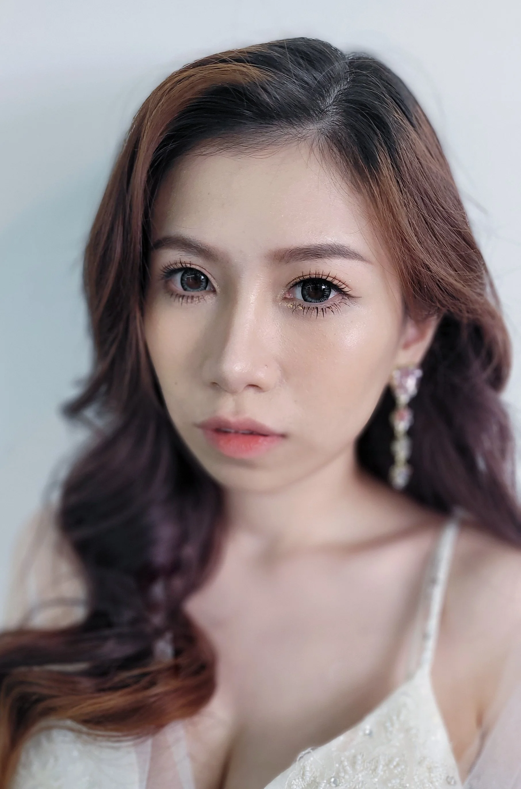 Korean-Style Pre-Wedding Makeup Singapore
Achieve a radiant, flawless look with our Korean-style pre-wedding makeup in Singapore. This style enhances your natural beauty with soft, glowing skin, delicate eye makeup, and subtle blush for a timeless, r