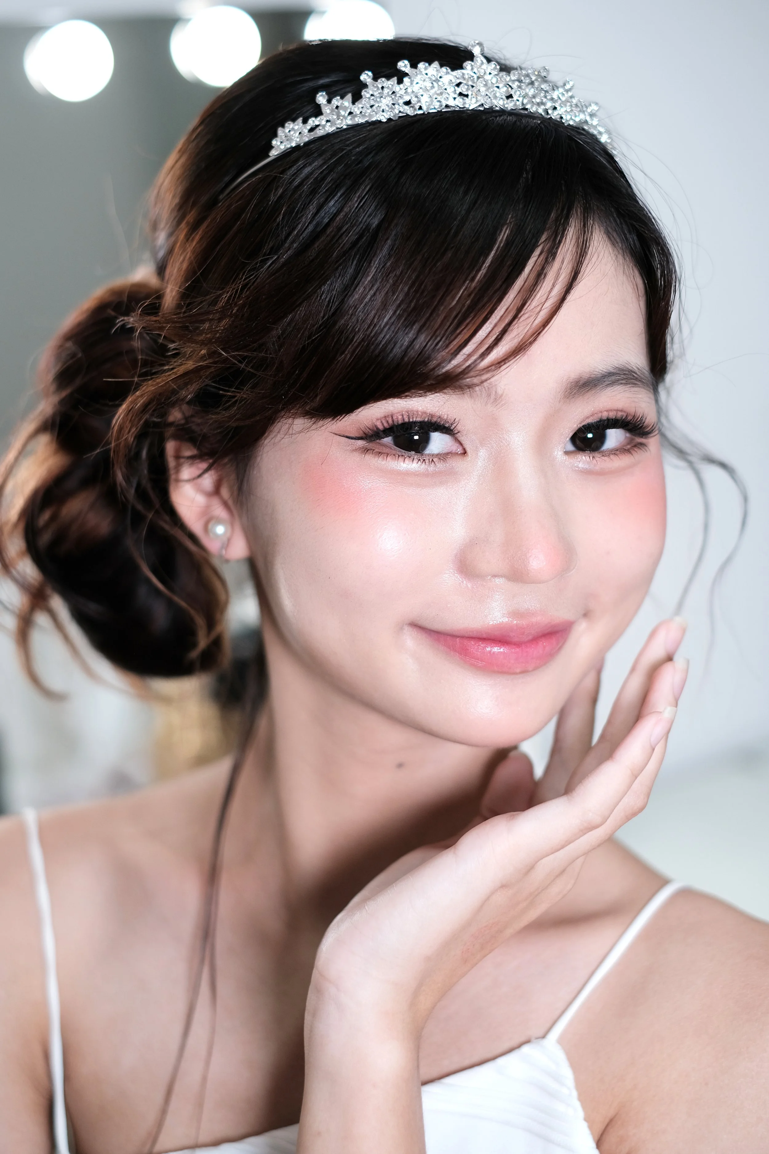 Korean-Style Bridal Makeup Singapore
Achieve a soft, radiant, and flawless look with our Korean-style bridal makeup in Singapore. Designed to enhance your natural beauty, this style features glowing skin, subtle blush, and delicate eye makeup for a t