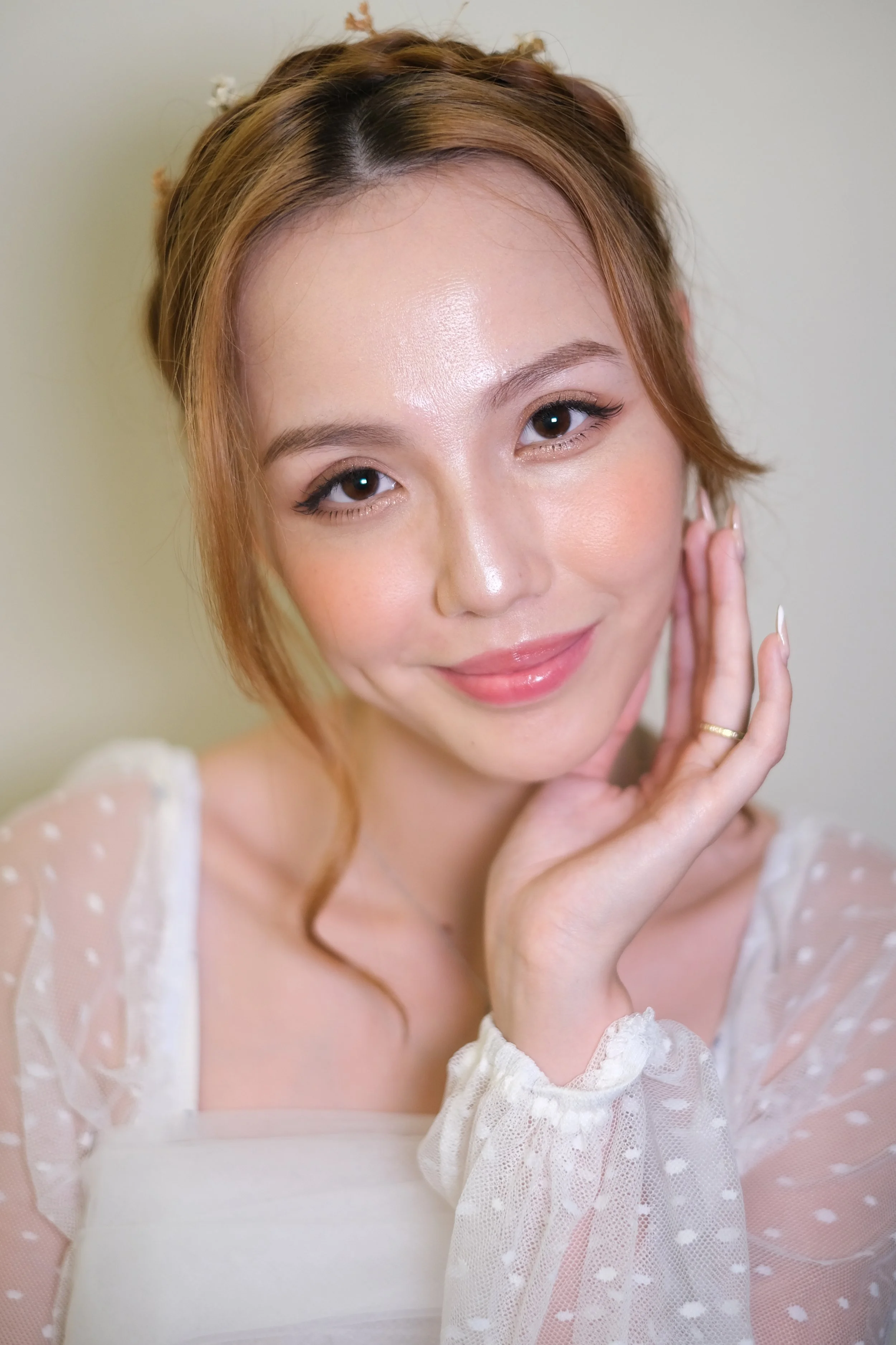 Korean-Style Bridal Makeup Singapore
Achieve a soft, radiant, and flawless look with our Korean-style bridal makeup in Singapore. Designed to enhance your natural beauty, this style features glowing skin, subtle blush, and delicate eye makeup for a t