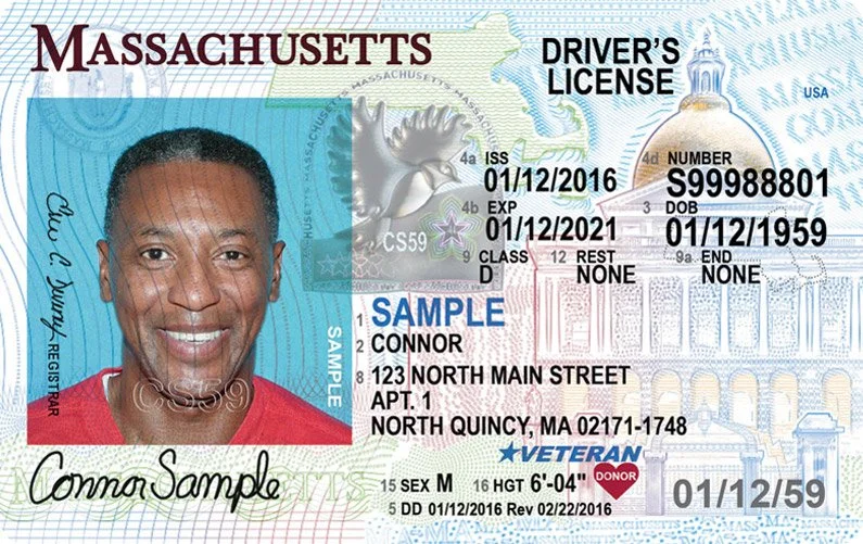 Massachusetts driver's license featuring a photo of Conner Sample, born January 12, 1959, with sample address at North Main Street, North Quincy, MA. The license is marked as veteran and shows various personal details, including license number.