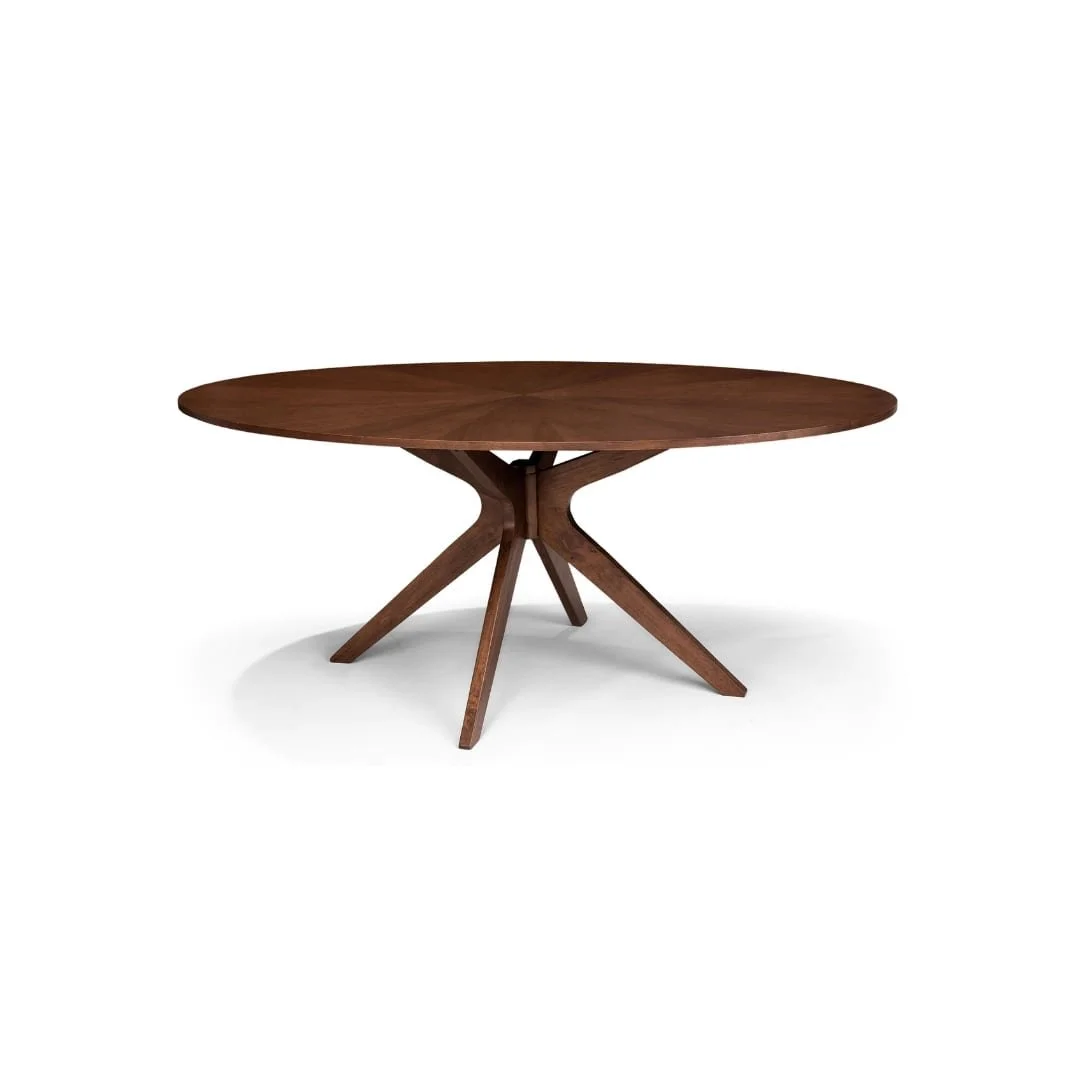 Wooden oval dining table with angled legs on a white background.
