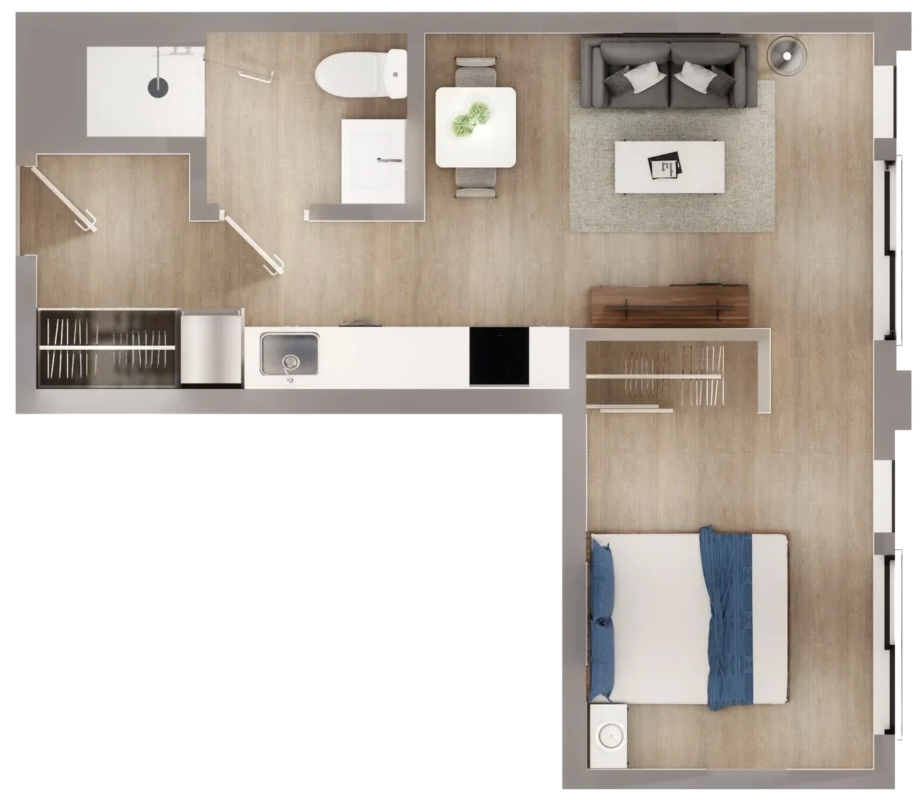 A top-down view of a small apartment layout with a bedroom, living room, kitchen, and bathroom. The bedroom has a bed with blue bedding and a nightstand. The living room features a gray sofa, a coffee table, and a TV stand. The kitchen includes a sink, stove, and counter space. The bathroom contains a bathtub, toilet, and shower area.
