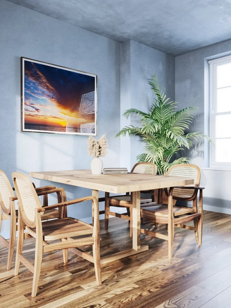 Dining area with wooden furniture and large plant-Angled.jpg