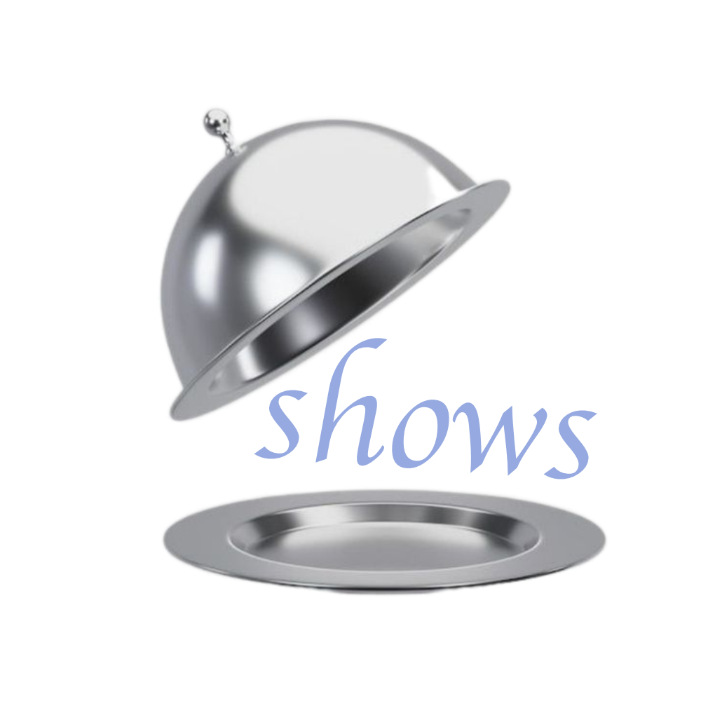 A silver serving dome and tray, typically used for presenting food at buffets or events.