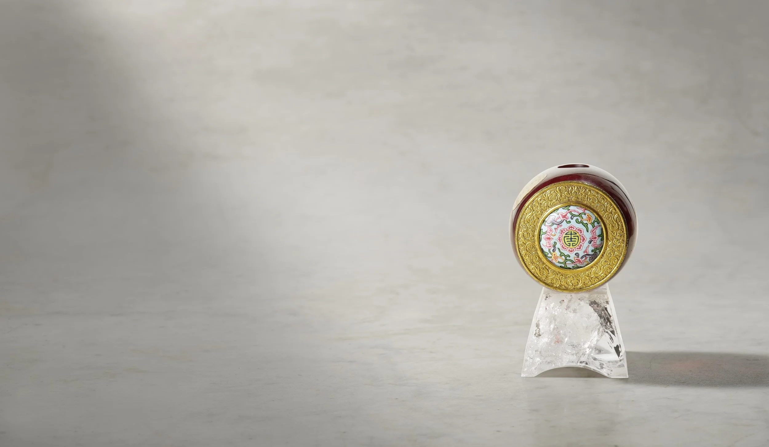 An imperial gilt-copper mounted Beijing enamel and ruby-red glass bird feeder, China: Beijing Palace Workshops, early Qianlong period (1736–95)