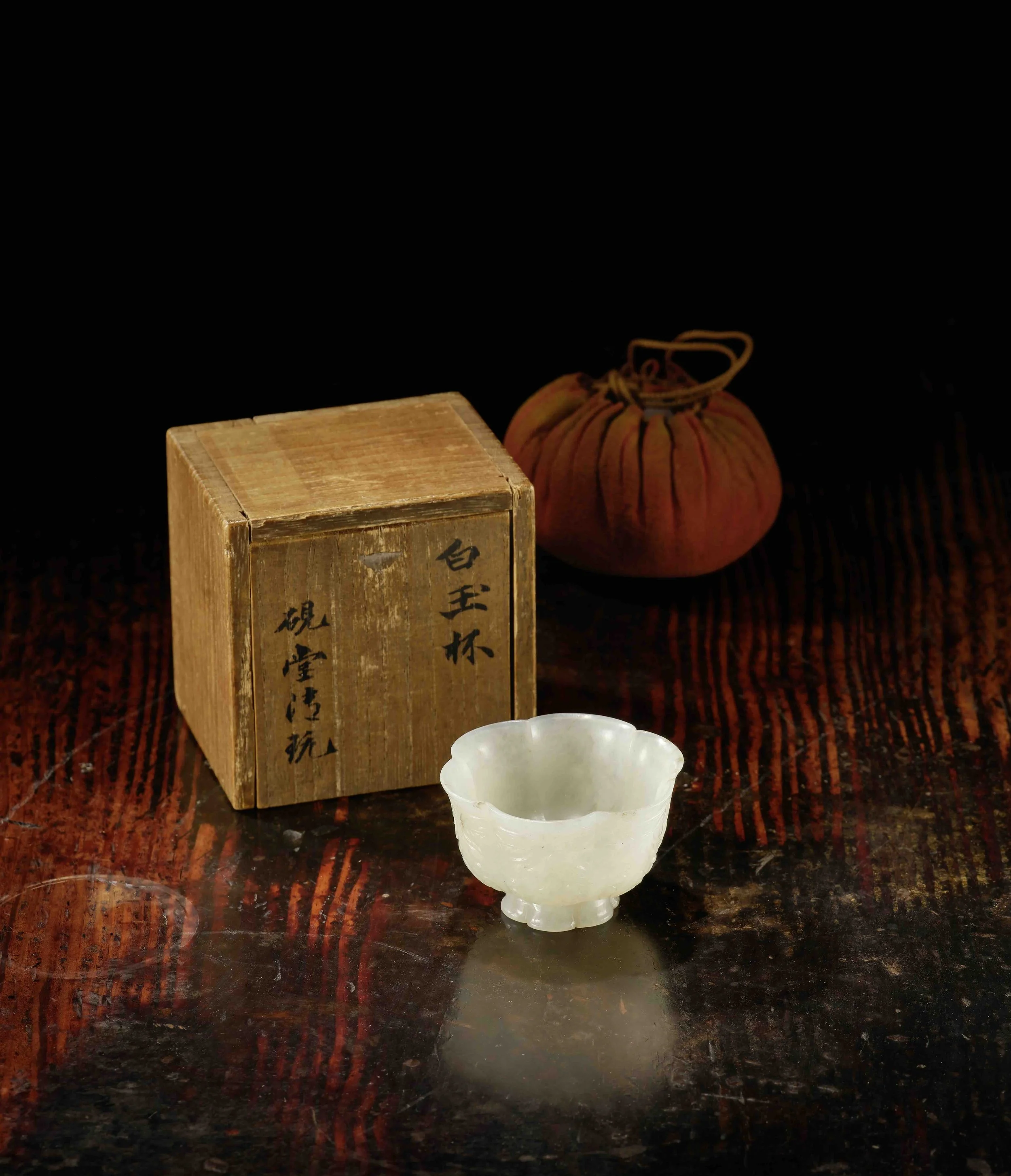 A white jade hexafoil cup, 
China: Tang dynasty (618–907)