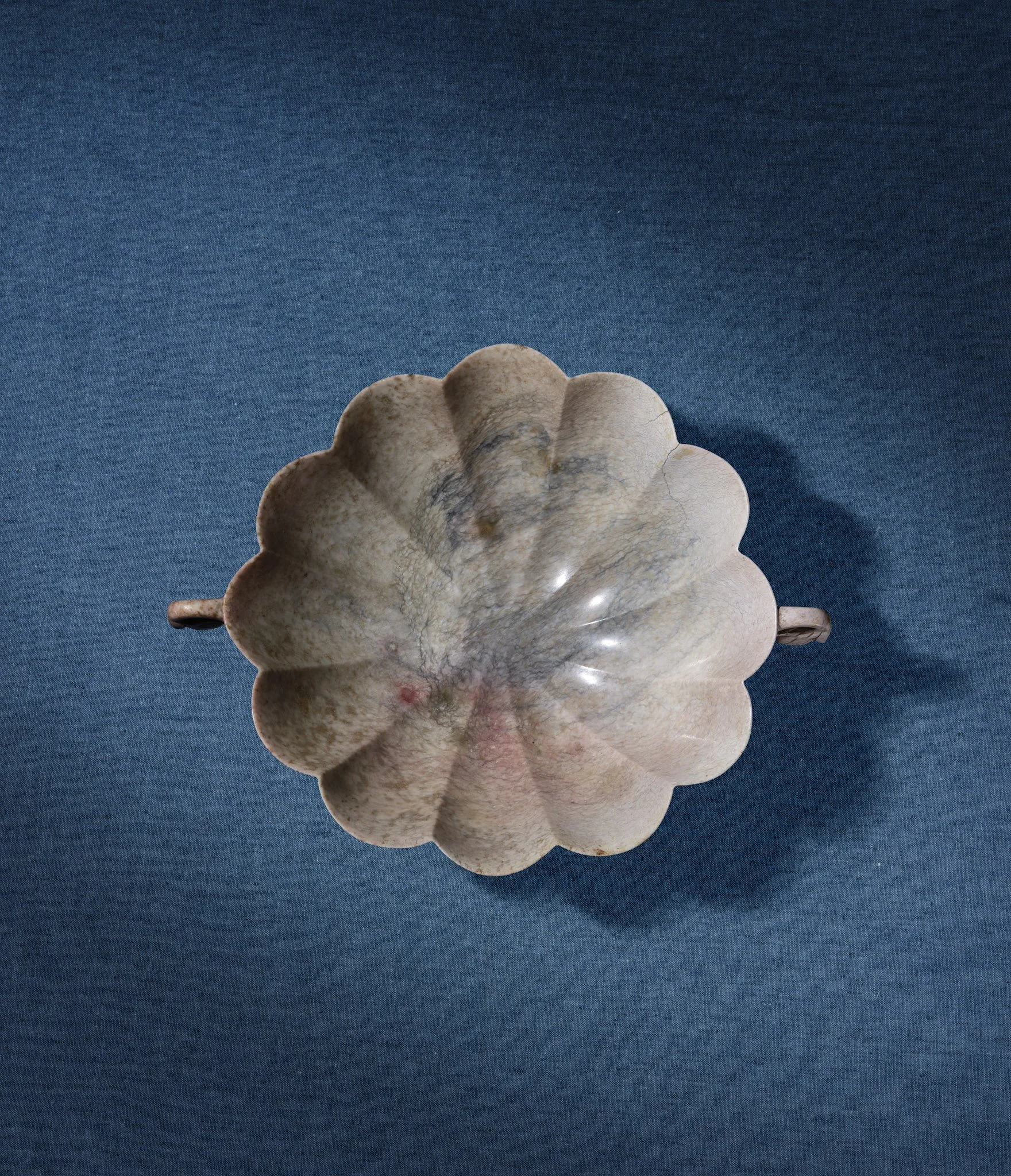 A chicken-bone jade fluted bowl,
Mughal India or China, 17th/18th century
