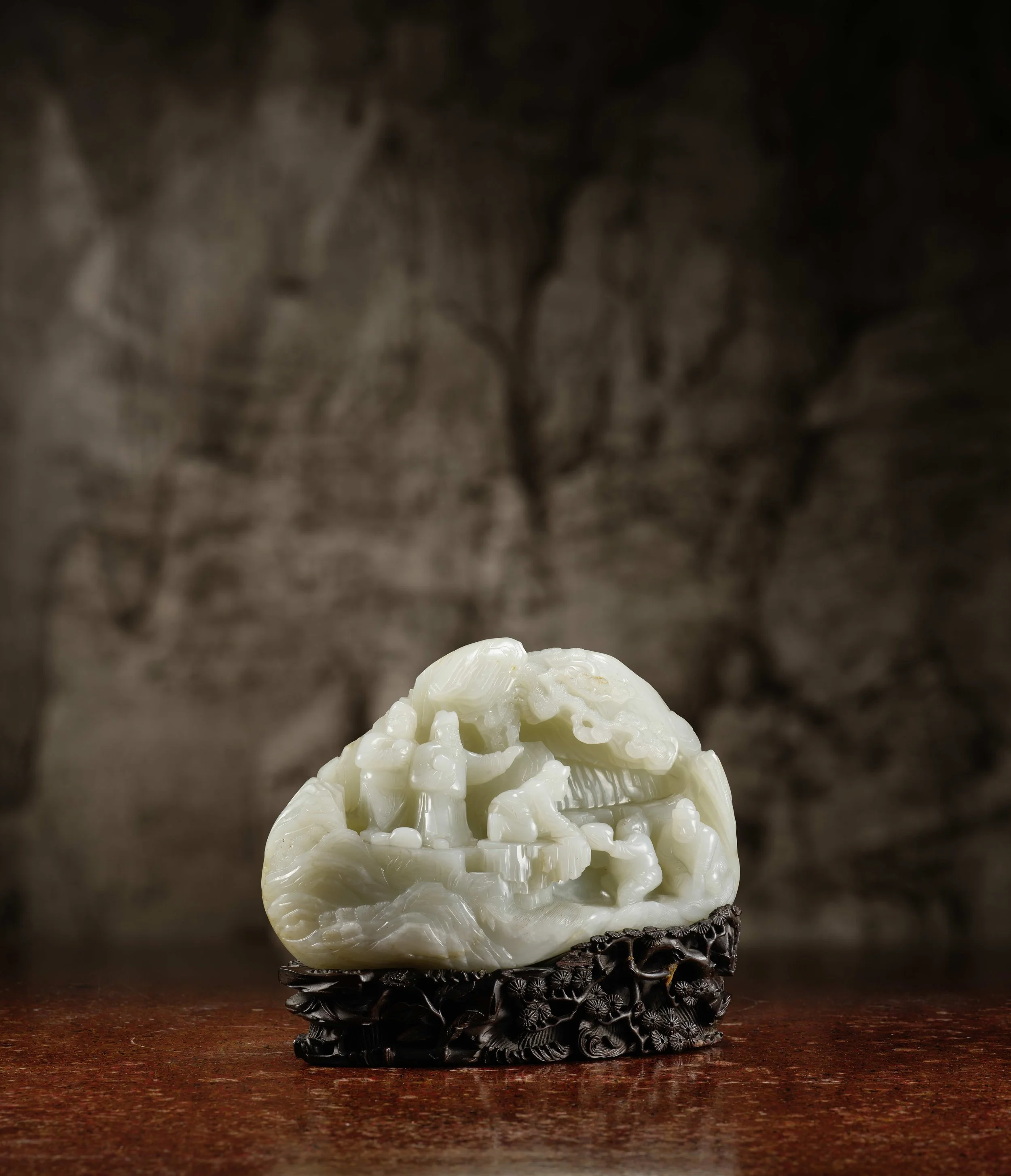 An imperially inscribed white jade boulder,
China, Qianlong mark and of the period (1736–95)
