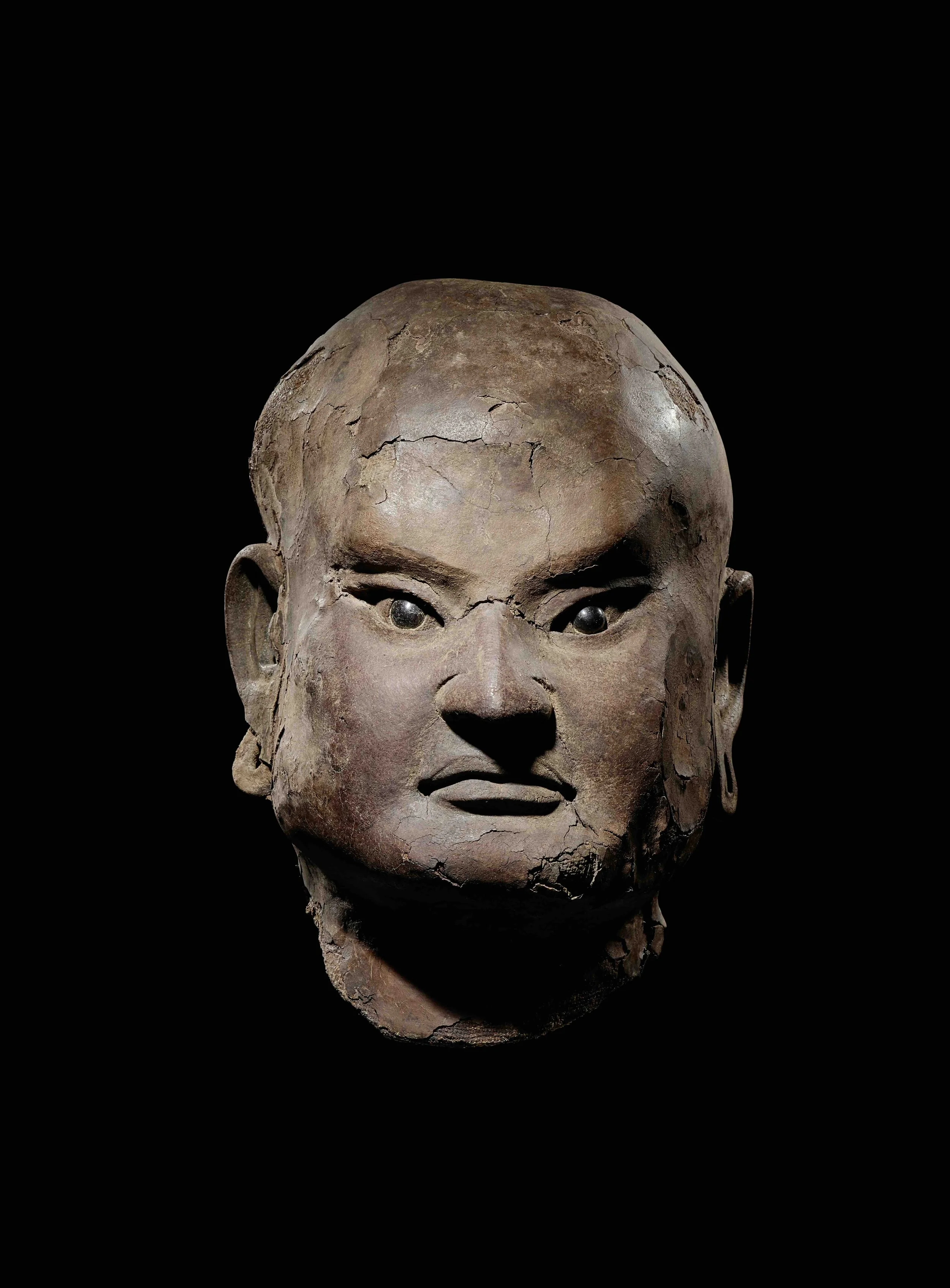 A dry lacquer head of a luohan, 
China: Southern Song dynasty (1128-1279), stand