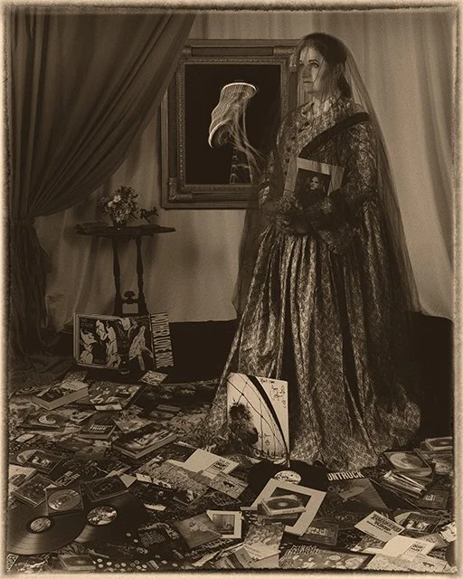 photo of a woman in a long dress and veil standing in a room featuring vinyl on the ground, and a distorted photo of the space needle framed. The picture is stylized with a sepia tone color.