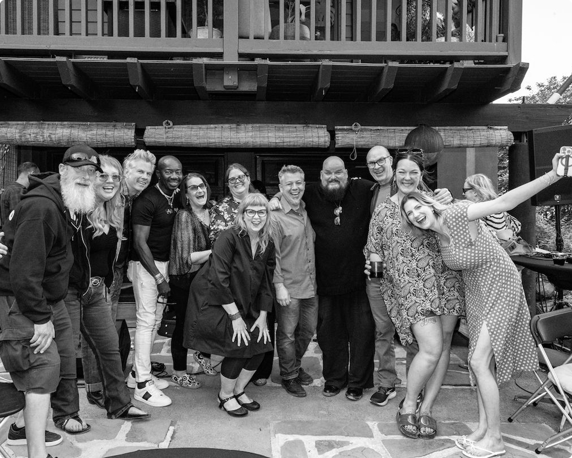 A black and white photo featuring 12 individuals who make As Many Weirdos Possible