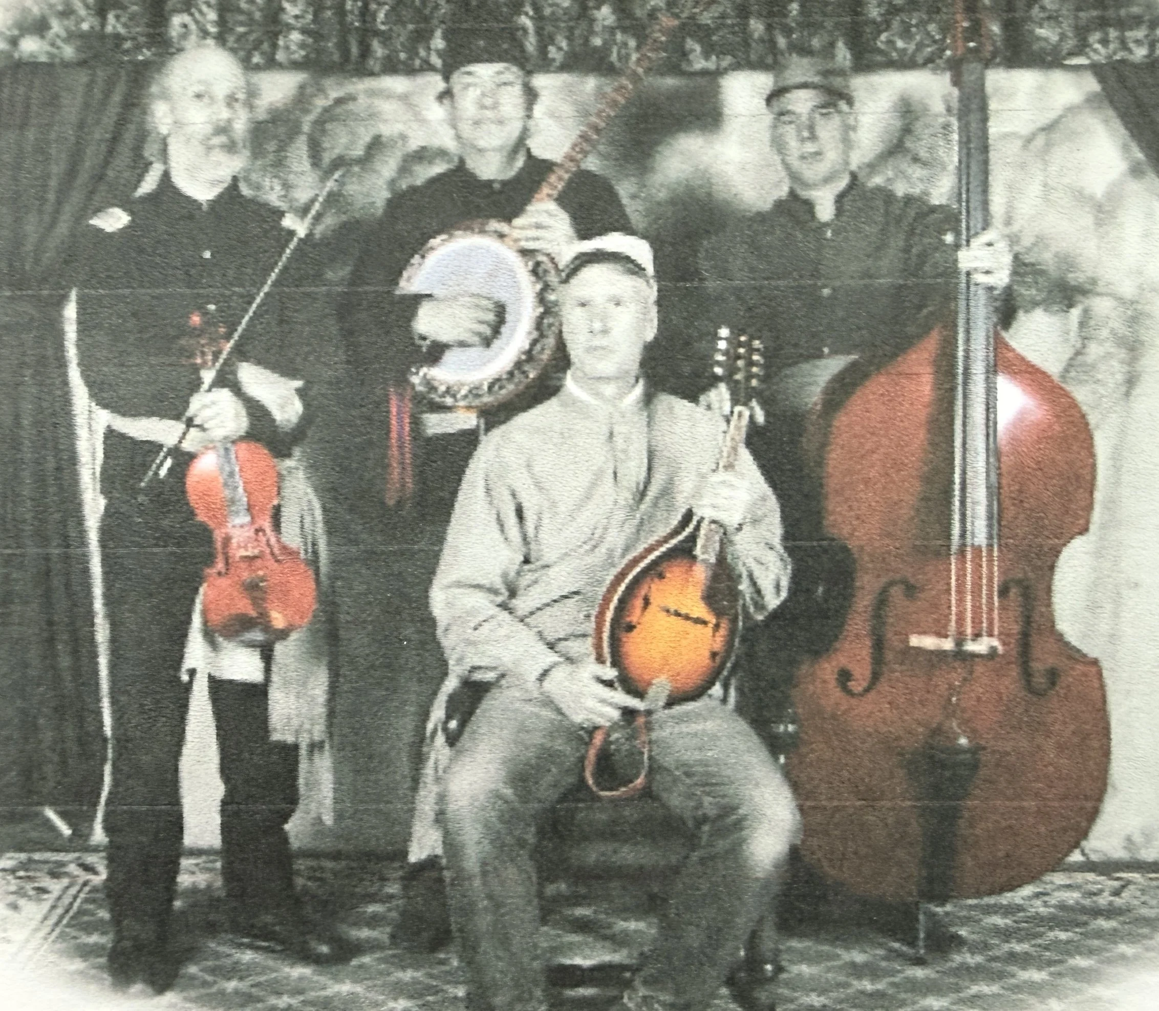 Photograph of four musicians in the You Can Live History Band, dressed in Civil War military costumes, holding their instruments.