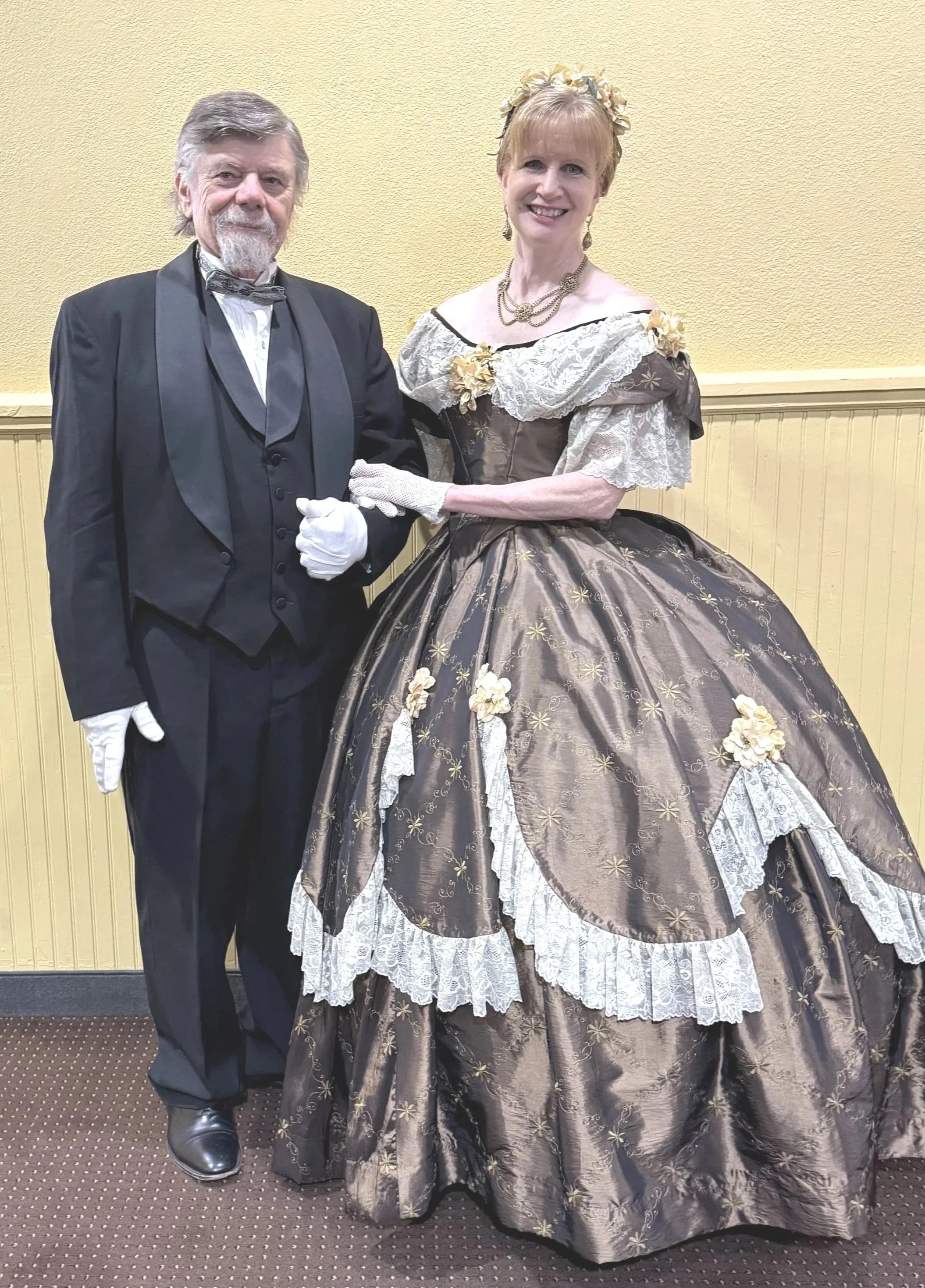 Mike and Sharon Guli, in historic costume, attending a Civil War era ball.
