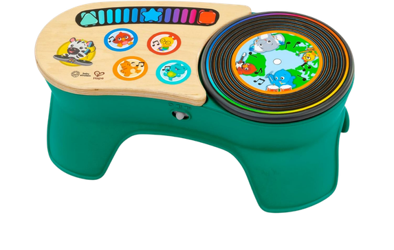 Colorful children's toy with a drum, piano keys, and animal characters on a wooden surface and a circular playing area.