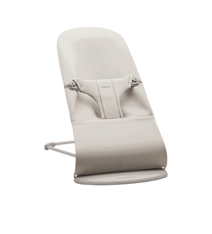 A baby bouncer chair with a light gray cushion and a safety harness.