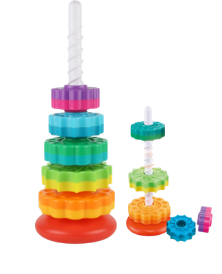 Colorful stacking rings toy with a purple ring, green and blue rings, and an orange ring, with additional loose rings nearby.