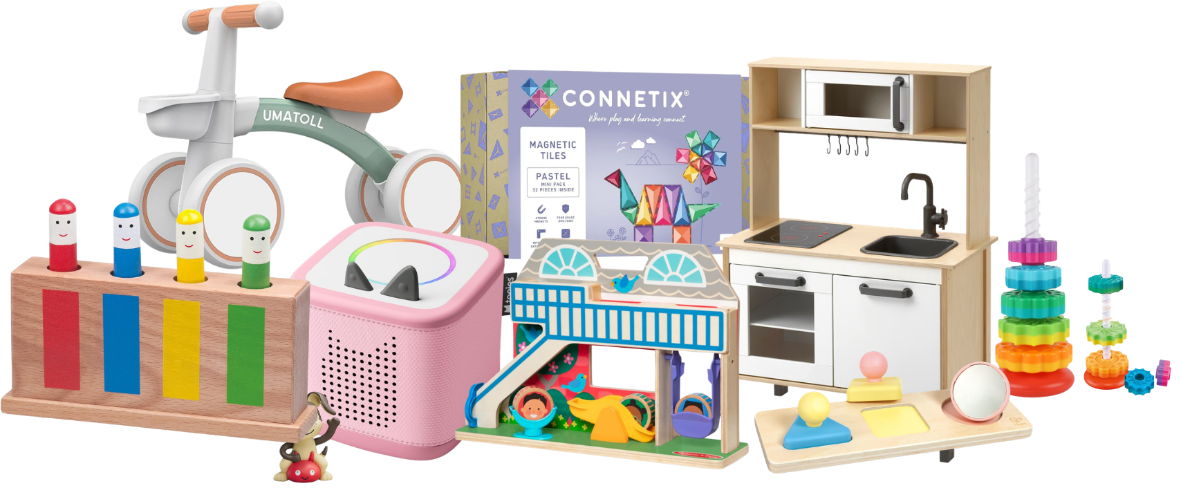 Collection of children's toys including a wooden puzzle with colorful pegs and faces, a pink karaoke machine, a wooden toy bike, a set of magnetic tiles in pastel colors, a wooden play kitchen set, a multi-colored stacking ring toy, and a small toy car with a girl figure.