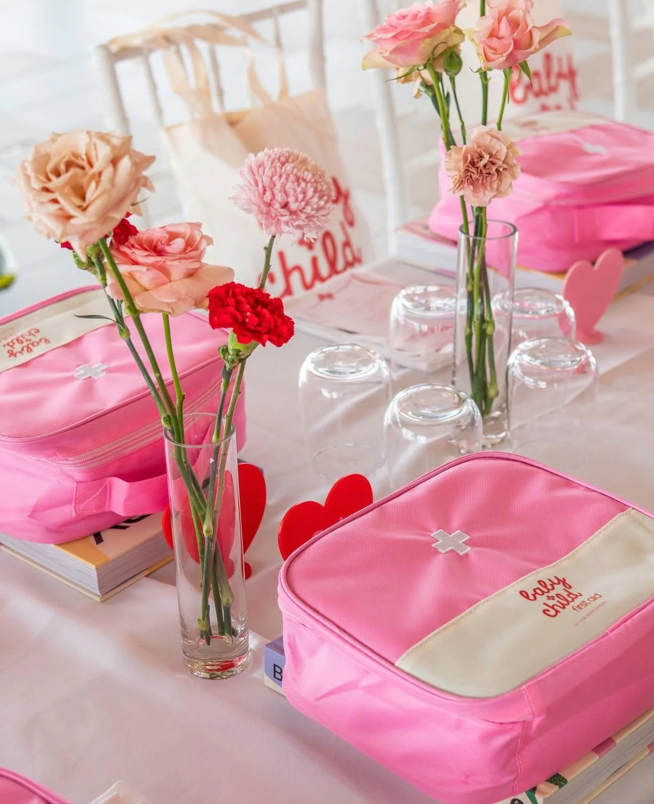 Bold ombr&eacute; fresh florals glowing the full length of the tables &bull; red to pink to white &bull; creating a seamless visual journey and a strong brand presence within the space.

Custom vinyl decals paired with personalised name tags by @the_