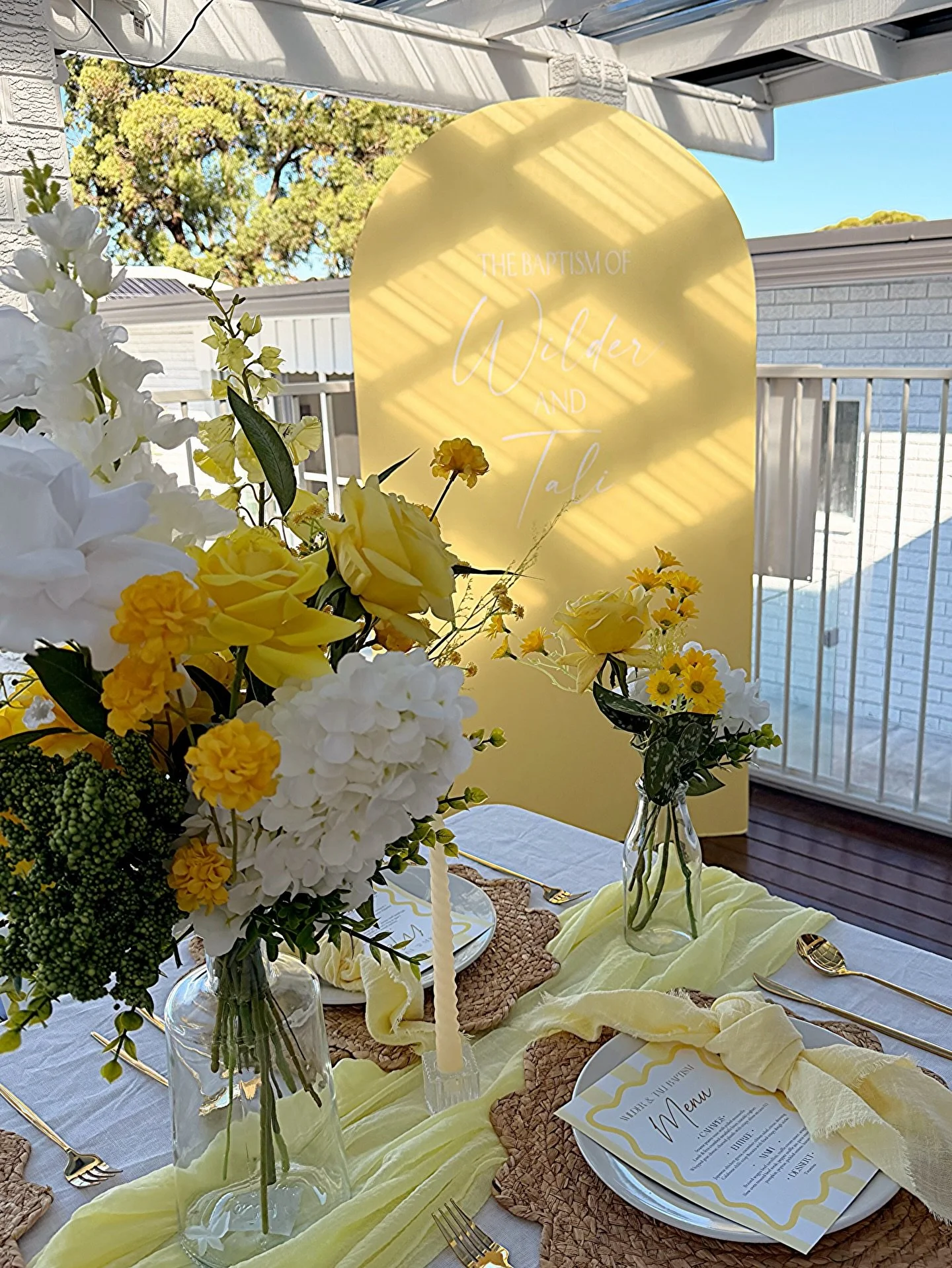 Wilder &amp; Talk&rsquo;s Baptism ✨💛

The brief was yellow&hellip; and every detail came together beautifully.
Soft yellow backdrop with delicate white cursive writing, layered with stunning yellow and white table florals to brighten the space perfe