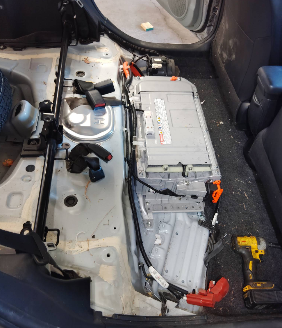 High-Voltage Battery being replaced in a Hybrid car at Chucks Auto Shop inc. in Bend Oregon