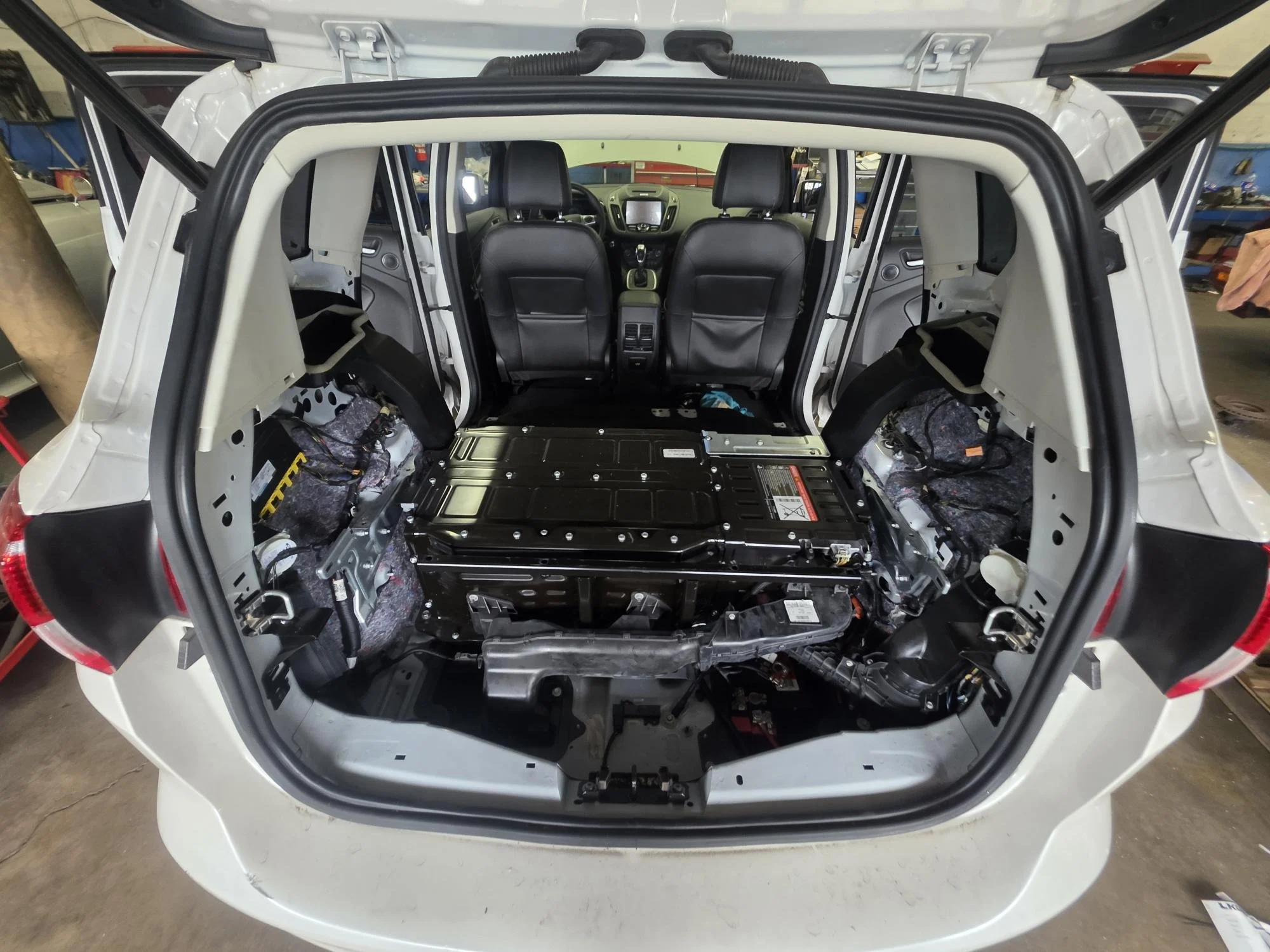 2017 Ford C-Max having its High-Voltage Battery Replaced at Chucks Auto Shop Inc. in Bend Oregon