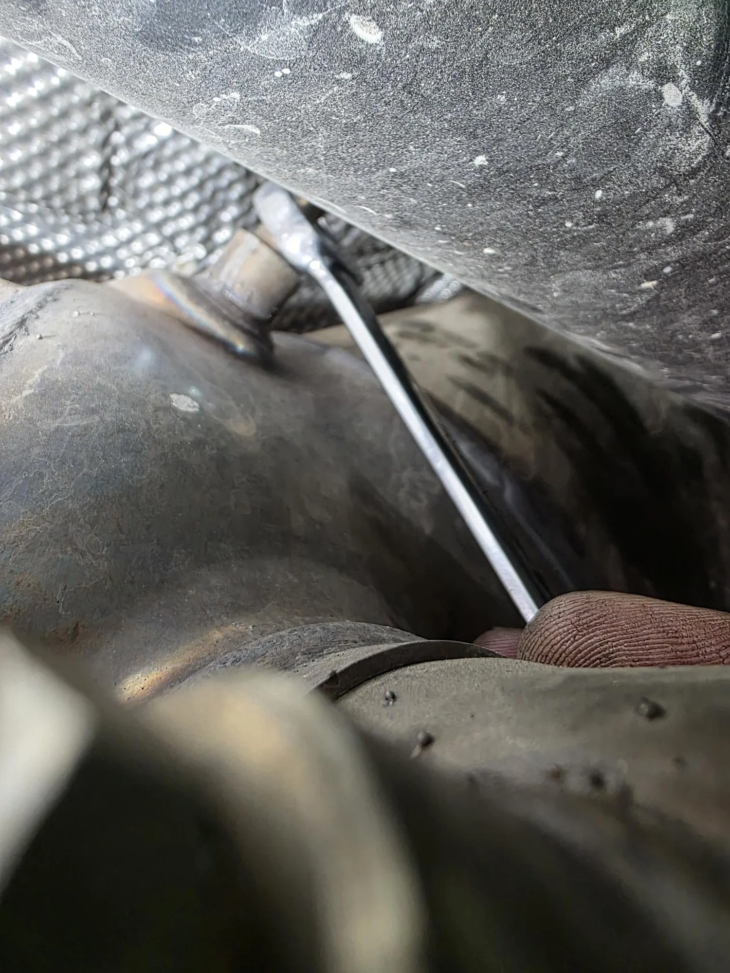 Exhaust Gas Temperature Sensor getting replaced at Chucks Auto Shop Inc. in Bend Oregon