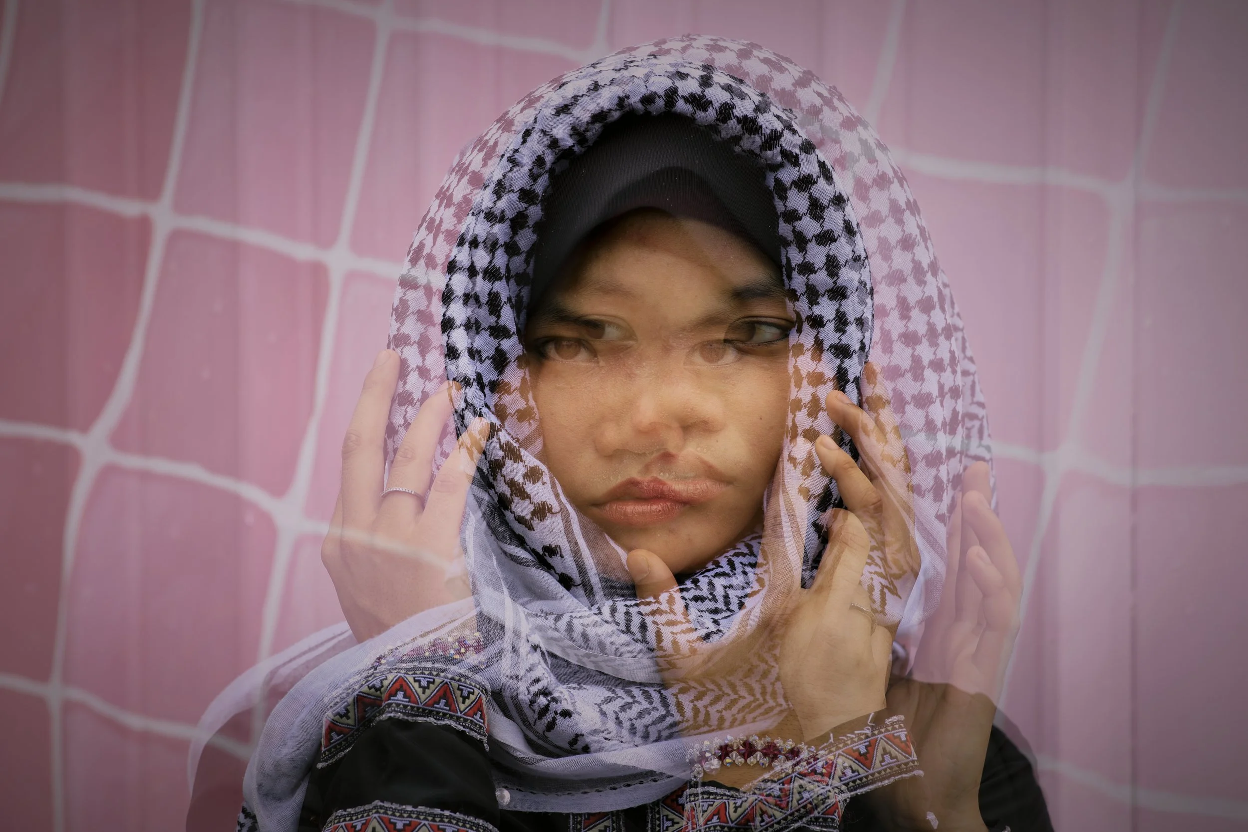 Taht Alaihtilal (Under Occupation). 

This photo shows the chaos and repression of the Roman colonial occupation of Palestine while your first born child is a political & religious dissident.