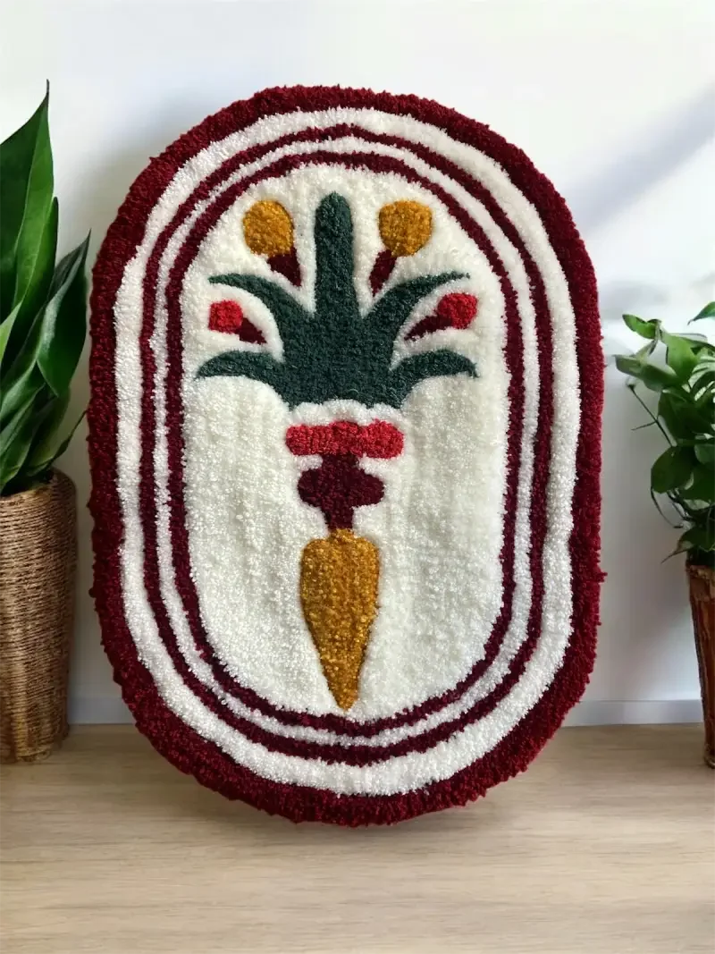 Tapis en laine avec un motif stylisé et retravaillé des mosaiques de l'opéra Garnier, encadré par des cercles rouges et blancs créé par la Maison et Atelier Ama Adao créé par Chloé Fortunet. 