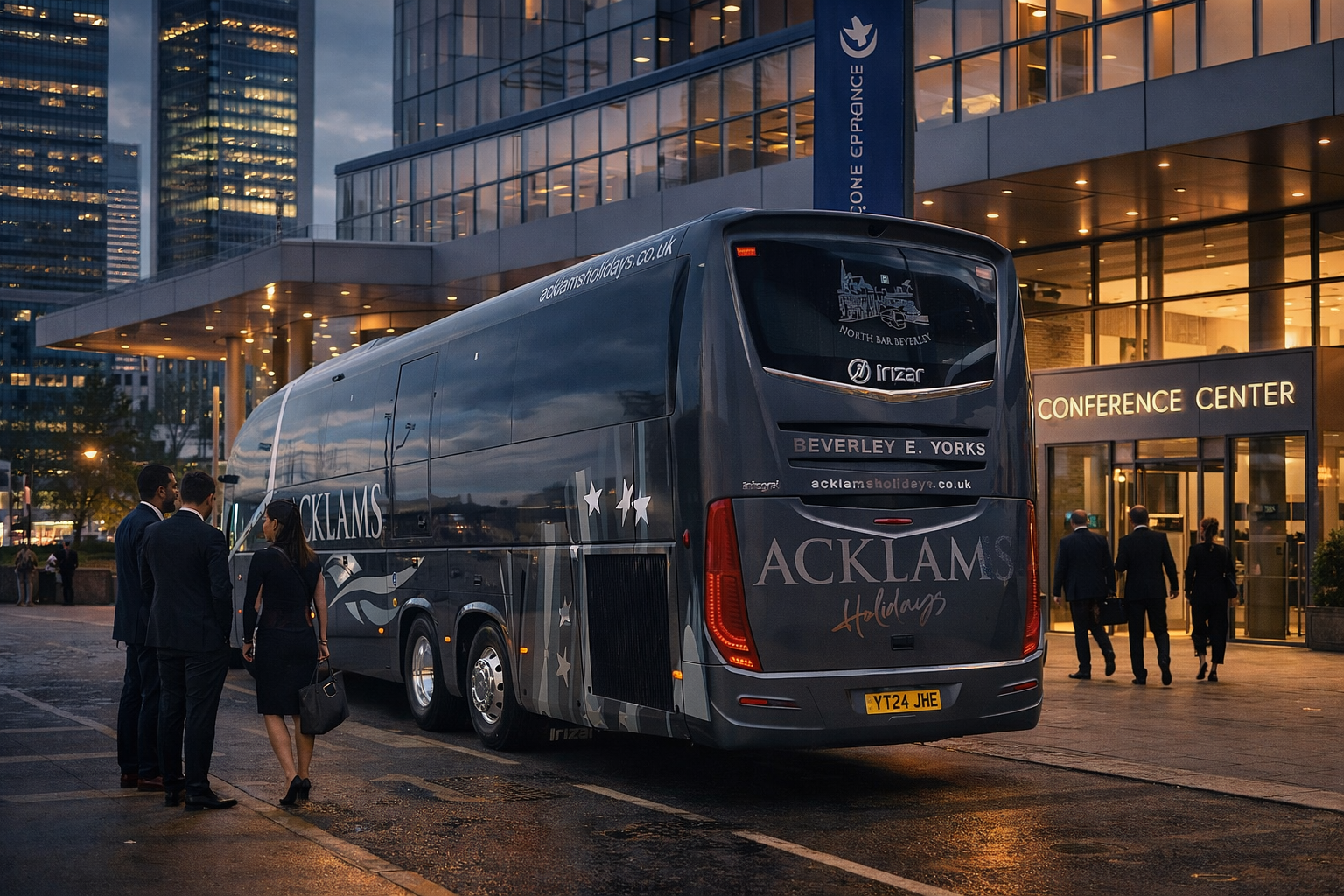 A large black bus with 'ACKLAMS Holidays' branding parked outside a conference center at dusk, with four businesspeople in suits standing nearby.