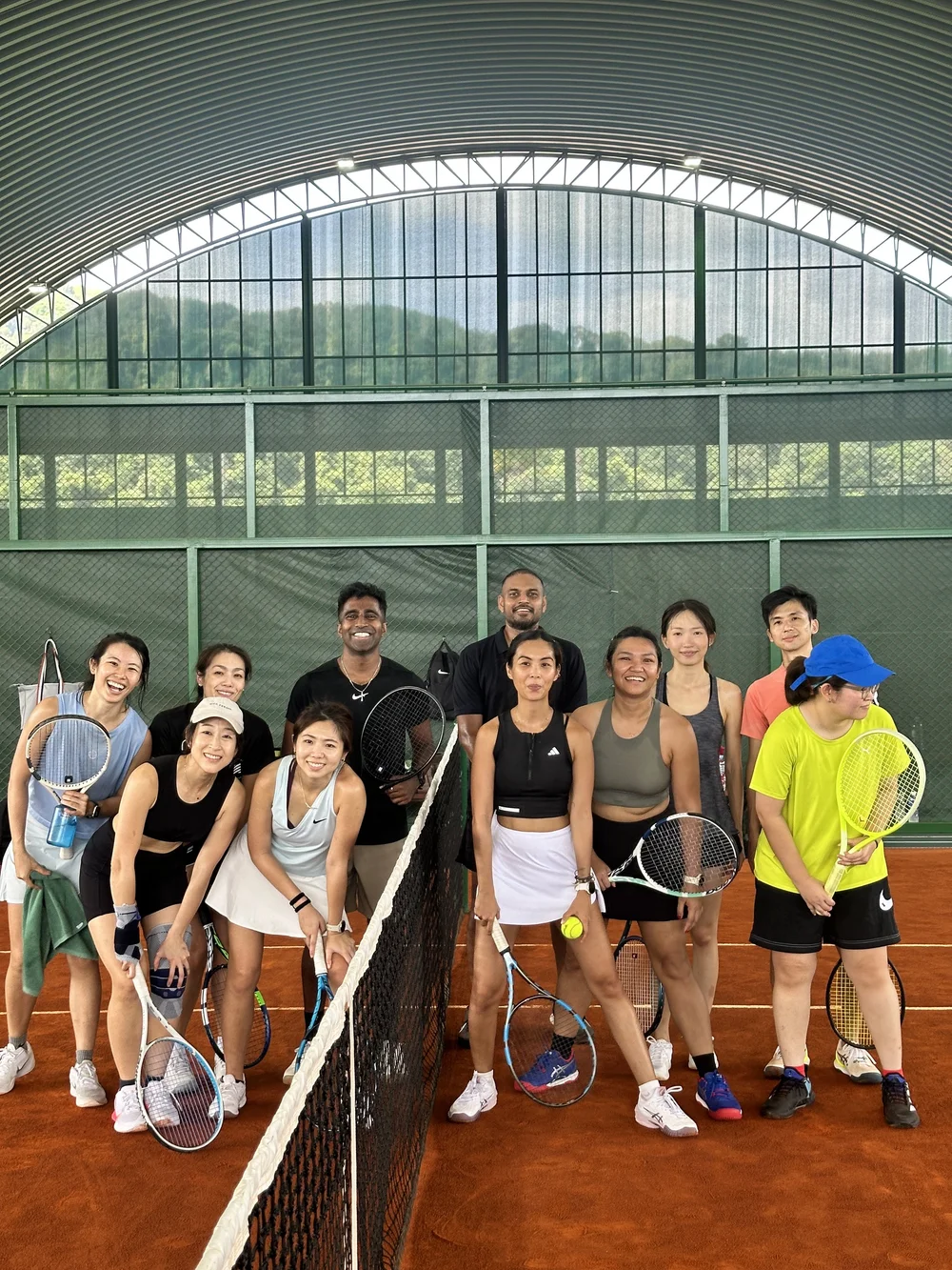 The Baseline group on a clay court in Phuket