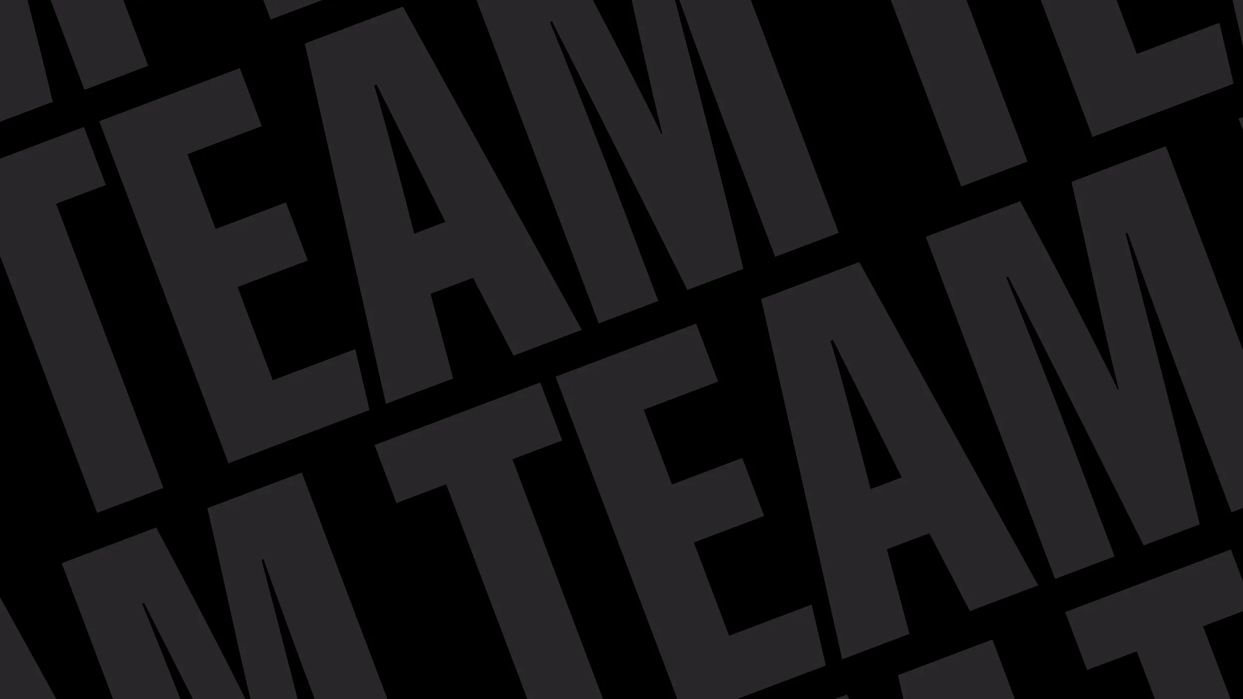 Black background with large, bold, dark gray text repeating the word 'FREAK' multiple times in a pattern.