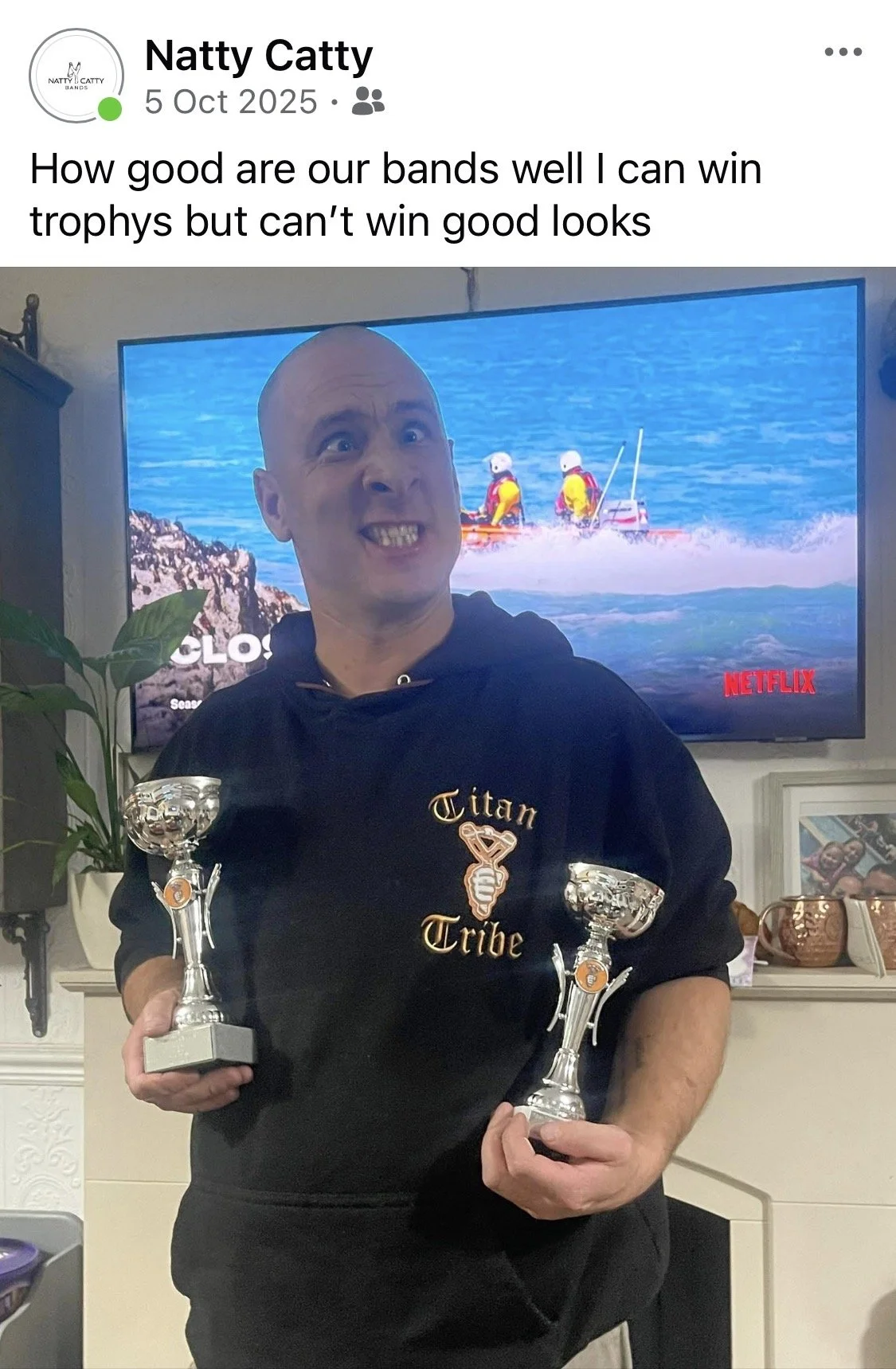 Phil Gaunt Natty Catty Bands holding two trophies after the Kent competition