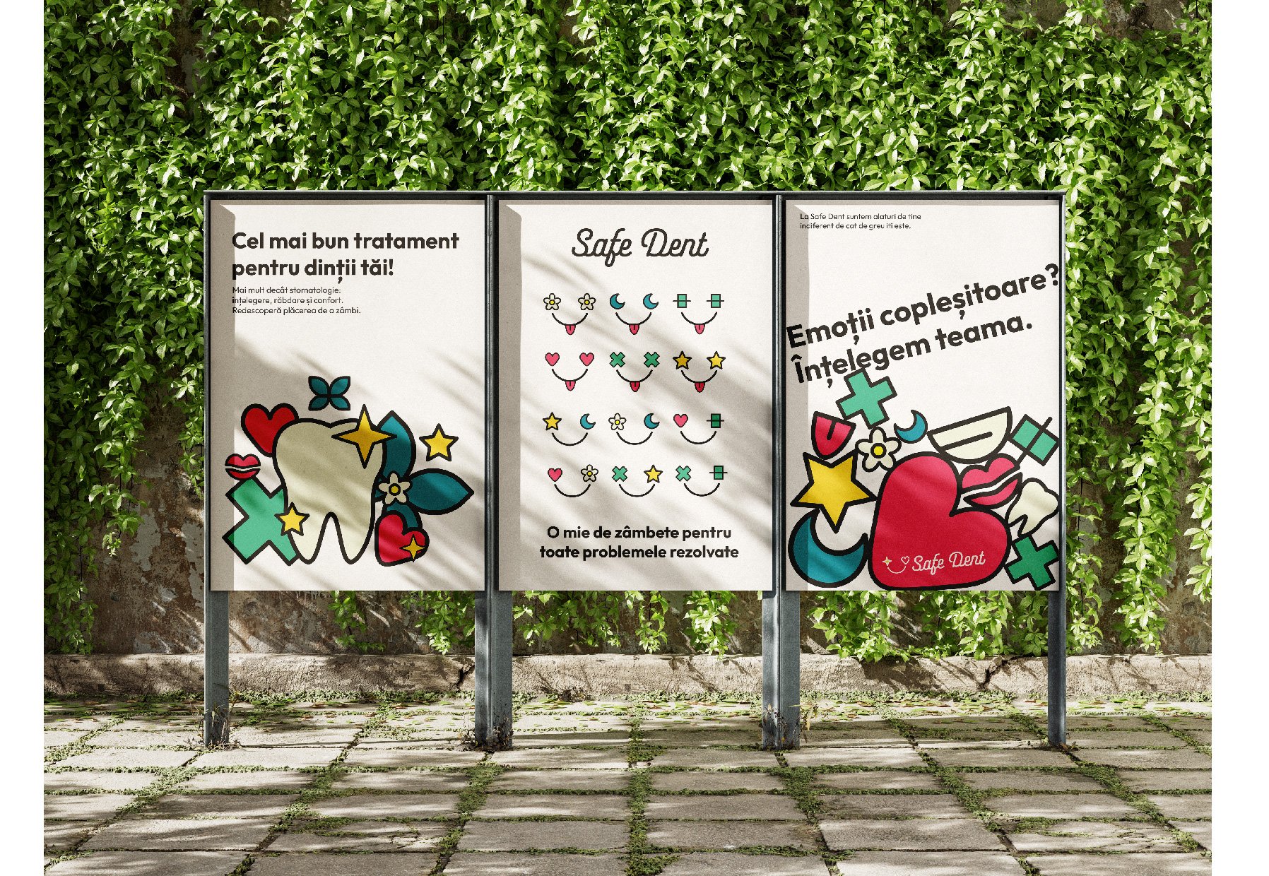 Three informational posters promoting dental health, decorated with colorful graphics of teeth, hearts, flowers, stars, and medical symbols, mounted on metal stands outdoors against a leafy green hedge.