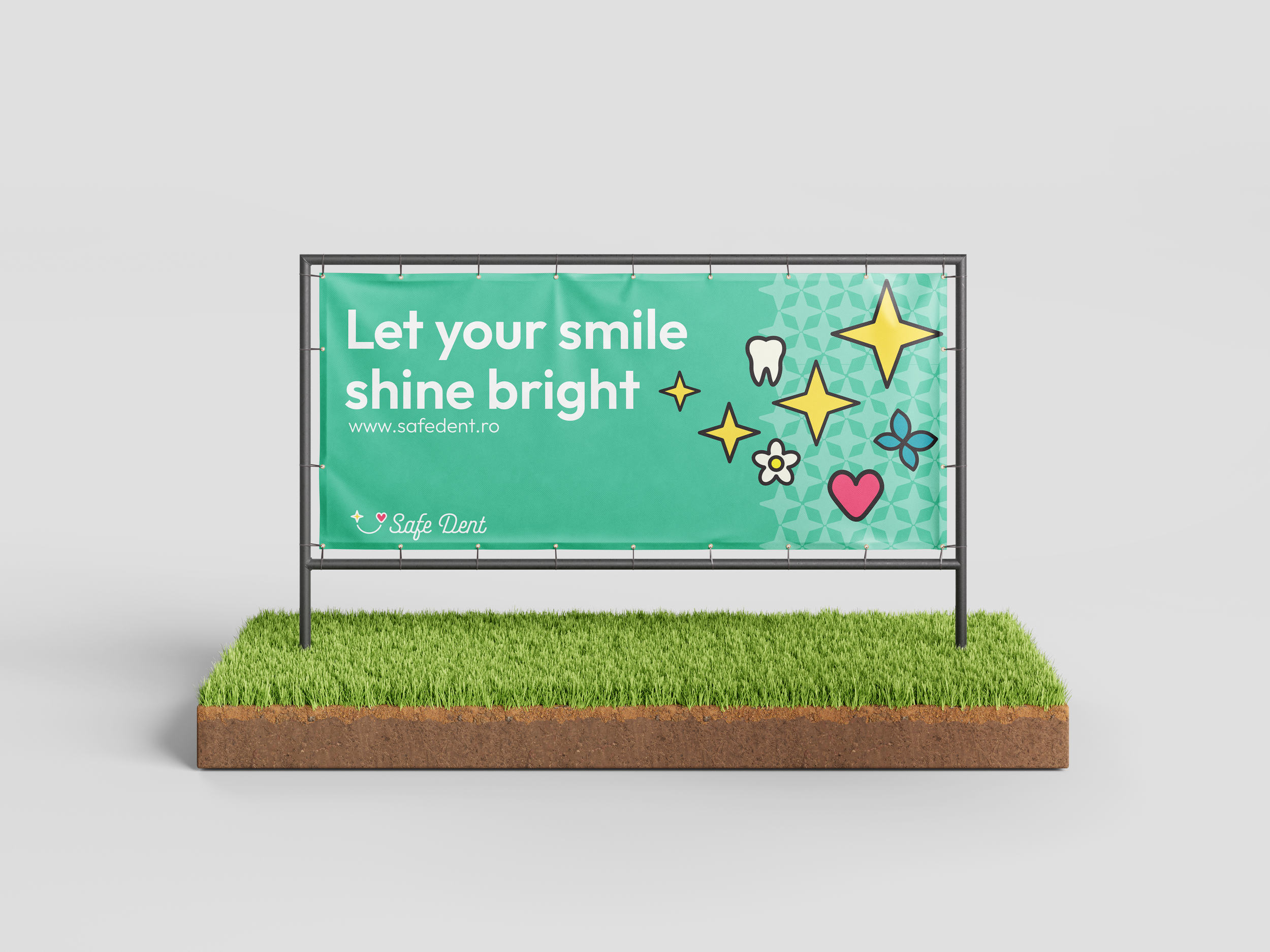 A green outdoor billboard with the message 'Let your smile shine bright' and cartoon dental-themed illustrations, including a tooth, stars, flowers, and a heart, promoting Safe Dent dental clinic.