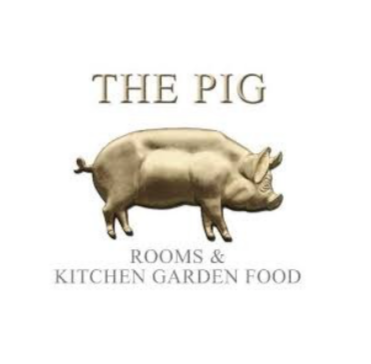 Sign with a pig illustration, reading "The Pig Rooms & Kitchen Garden Food"