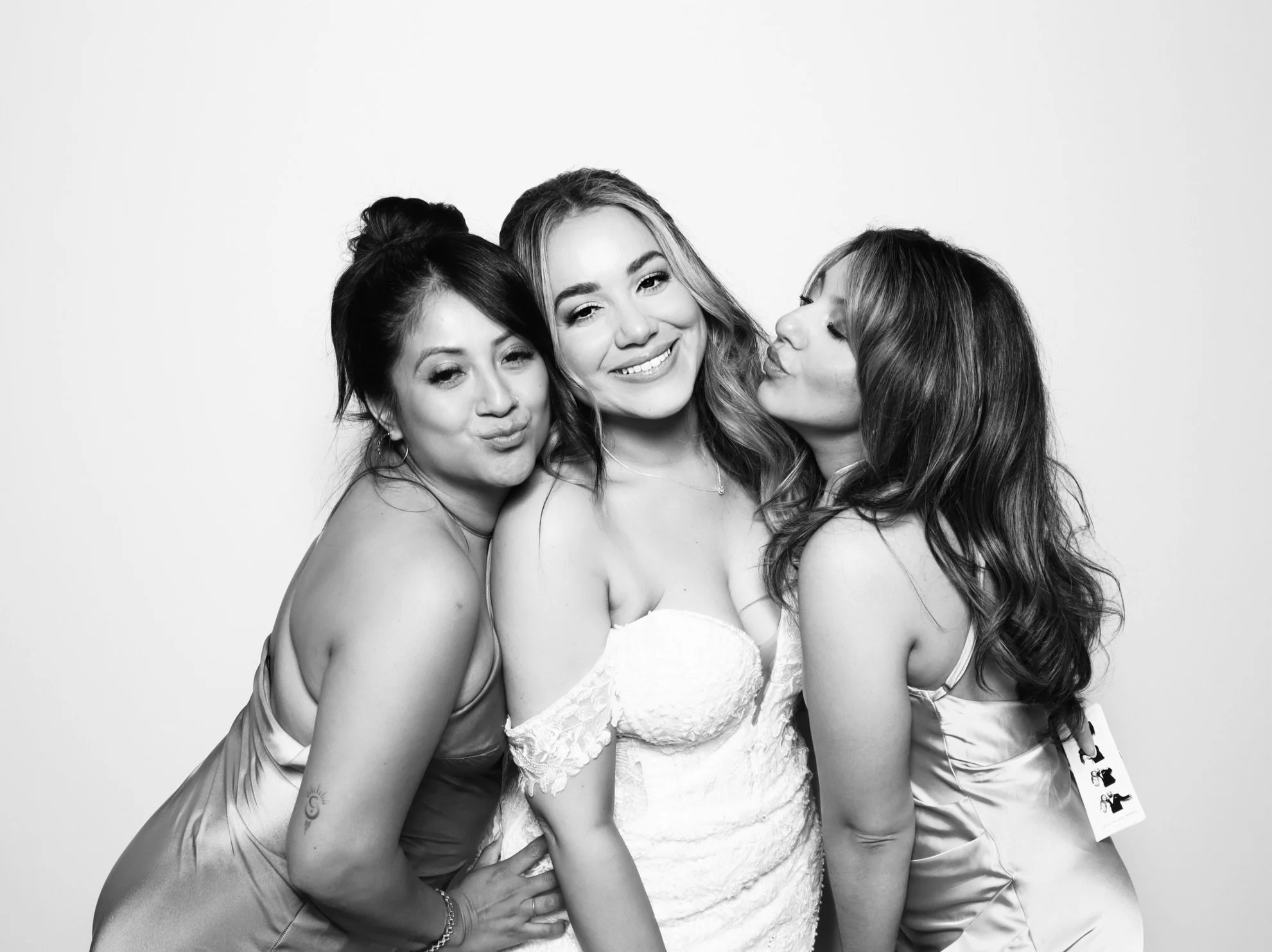 Bring the smiles, and we&rsquo;ll capture them iconically! Photobooths are so fun! Book your experience today 🩶