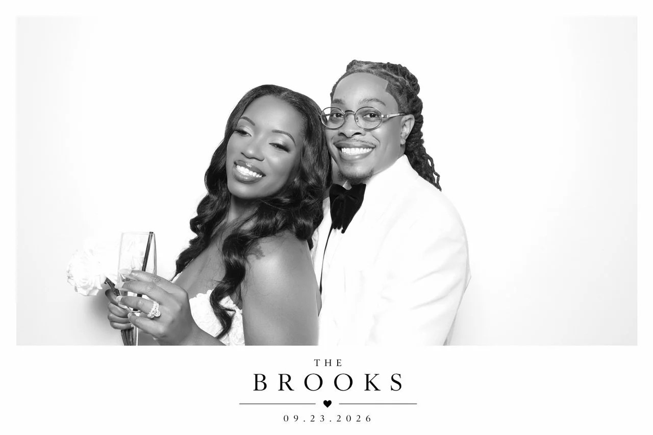 The Brooks brought the kind of energy that makes the booth worth having. From the champagne to the ring reveal, their wedding gave us frames we'll be showing off for a while. Three of our favorites, straight out of the black and white gallery.

Not a