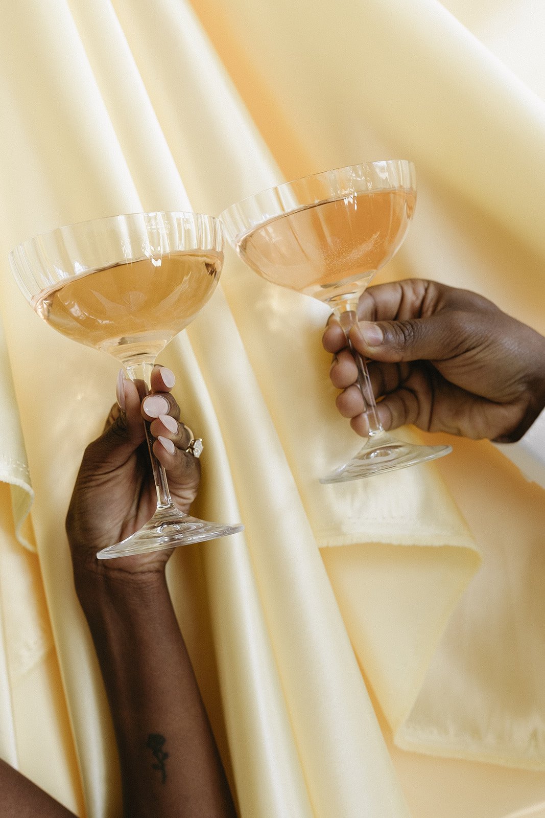 Color photo dynamic showing glasses of two champagnes