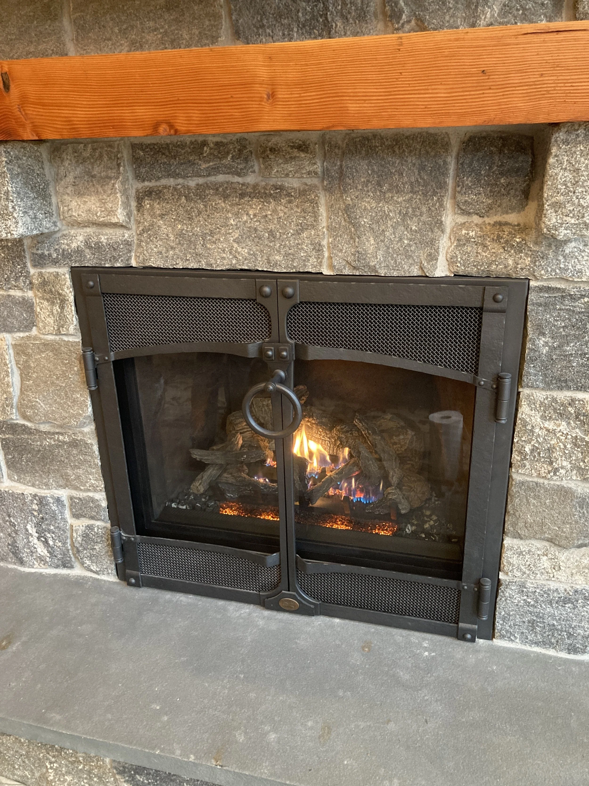 A modern gas fireplace installed by Silas Miller Stove & Chimney