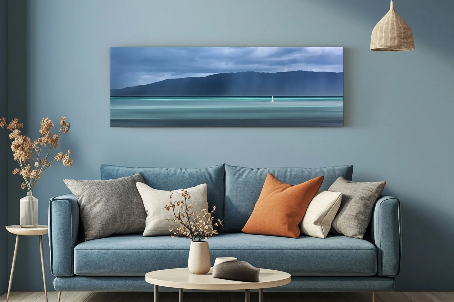 Seascape in blues and greene with a small sail boat and mountains in the background