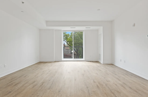 Empty white painted room with wood floor