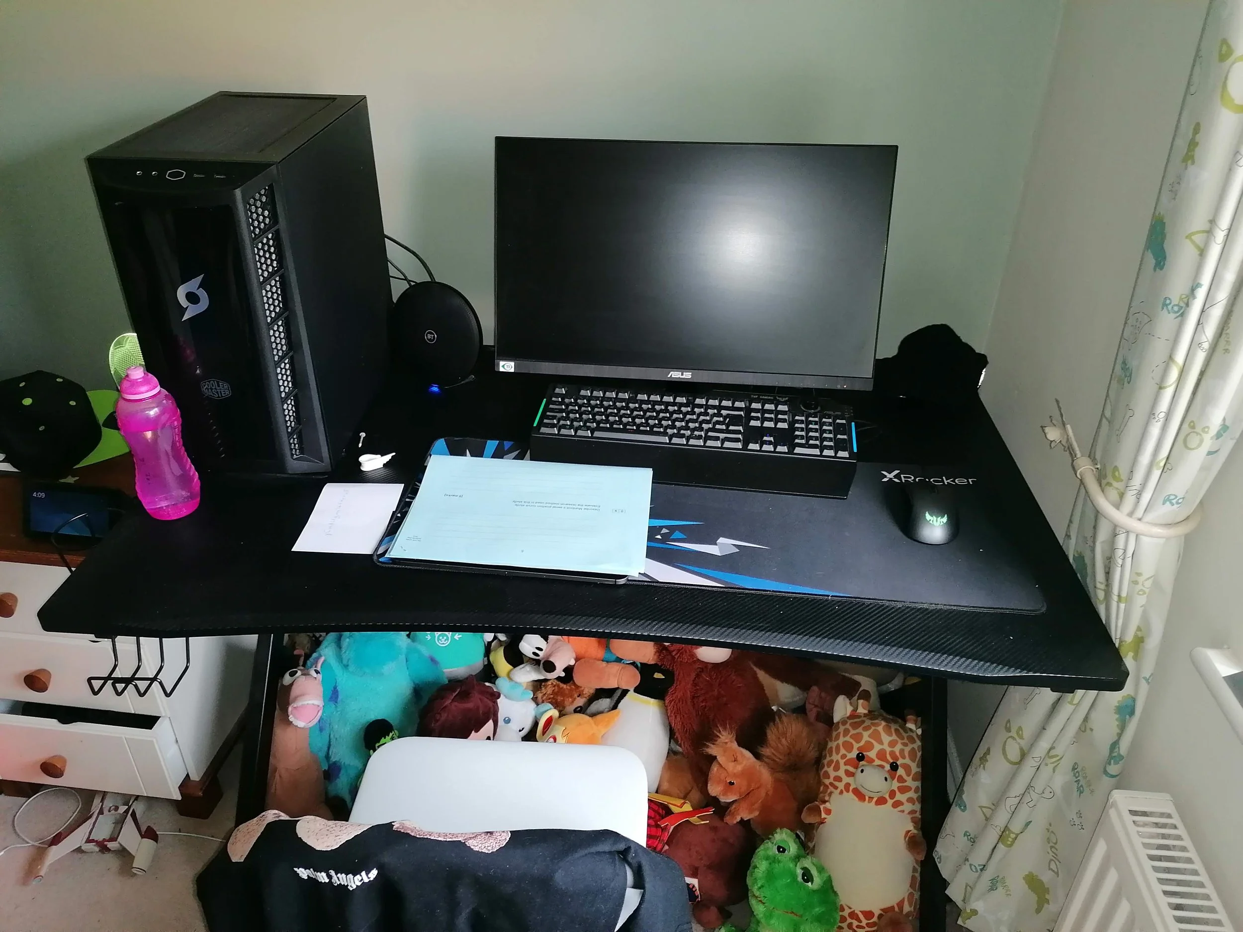 Northampton - Child’s gaming station clearly showing the lack of storage - before redesign by Omorfia Interior Design