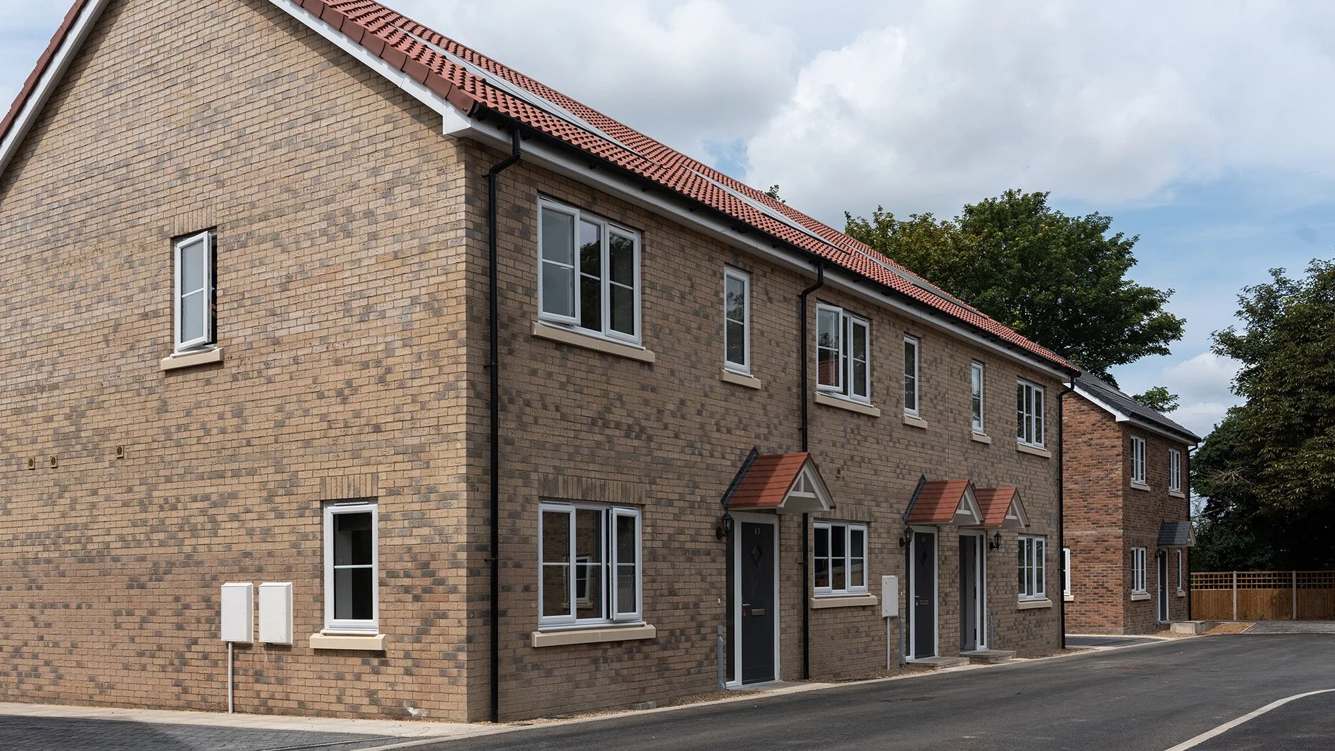 Row of brick-built homes along the street at Gowers Place