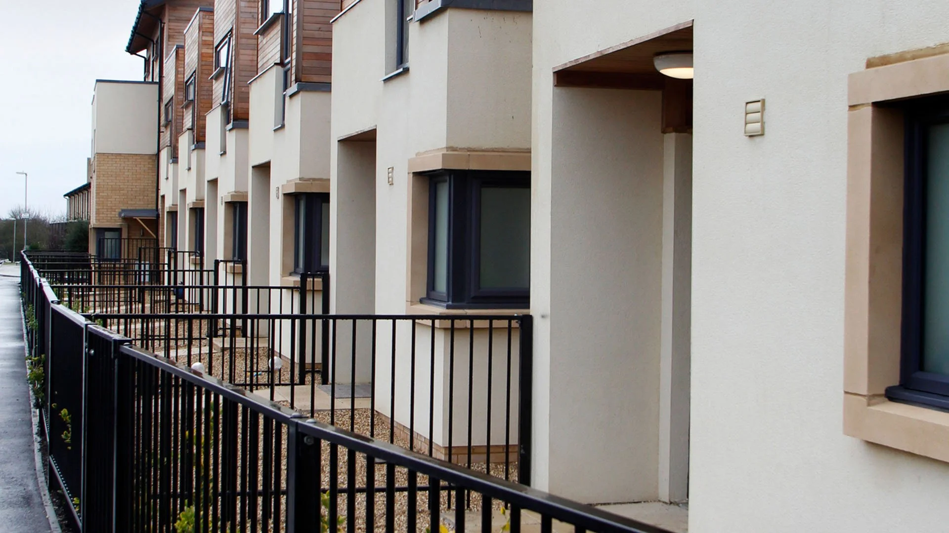 Aspen - street view of new white rendered housing 2.jpg
