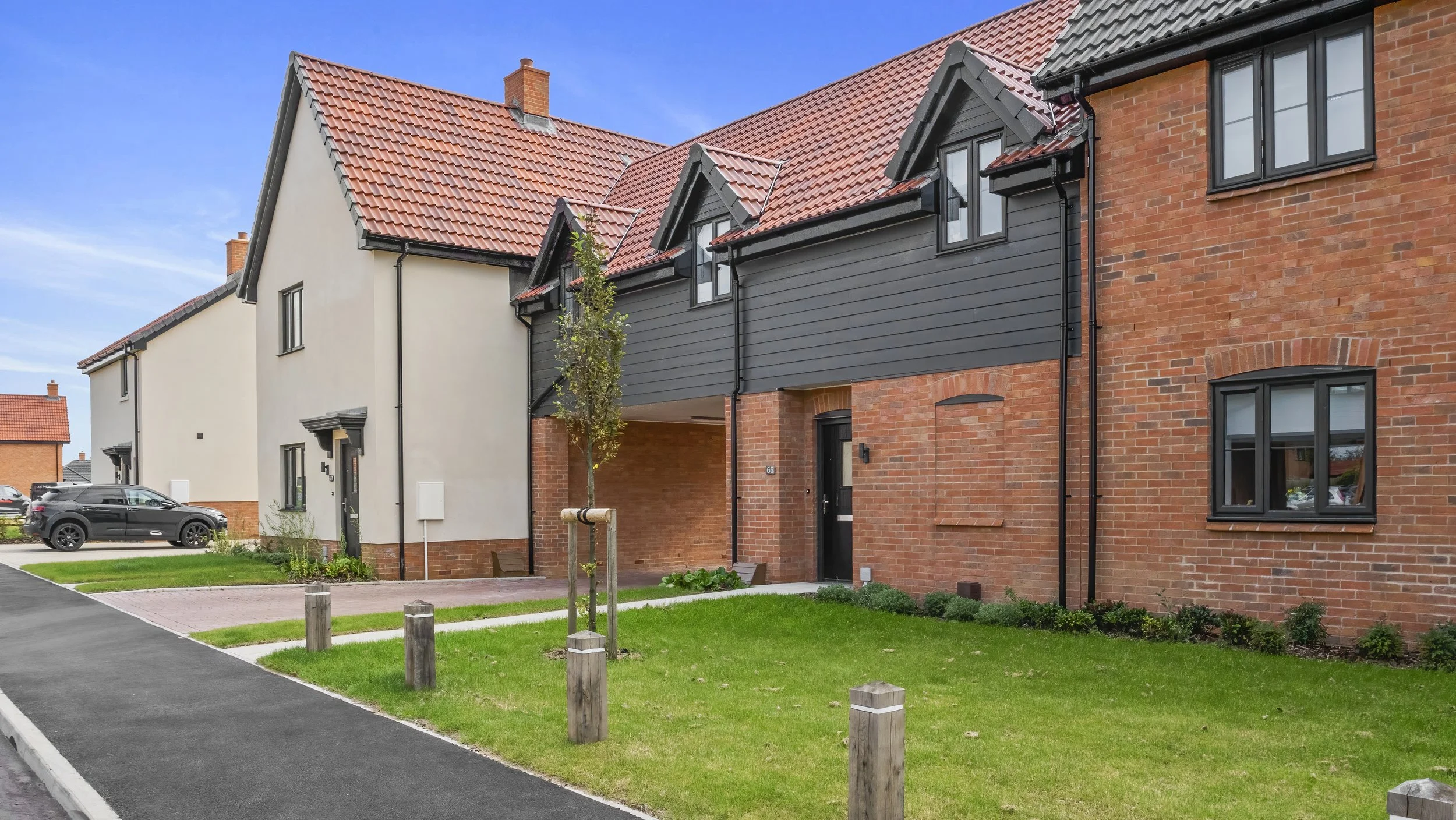 Mixed red-brick and rendered homes at The Lilacs