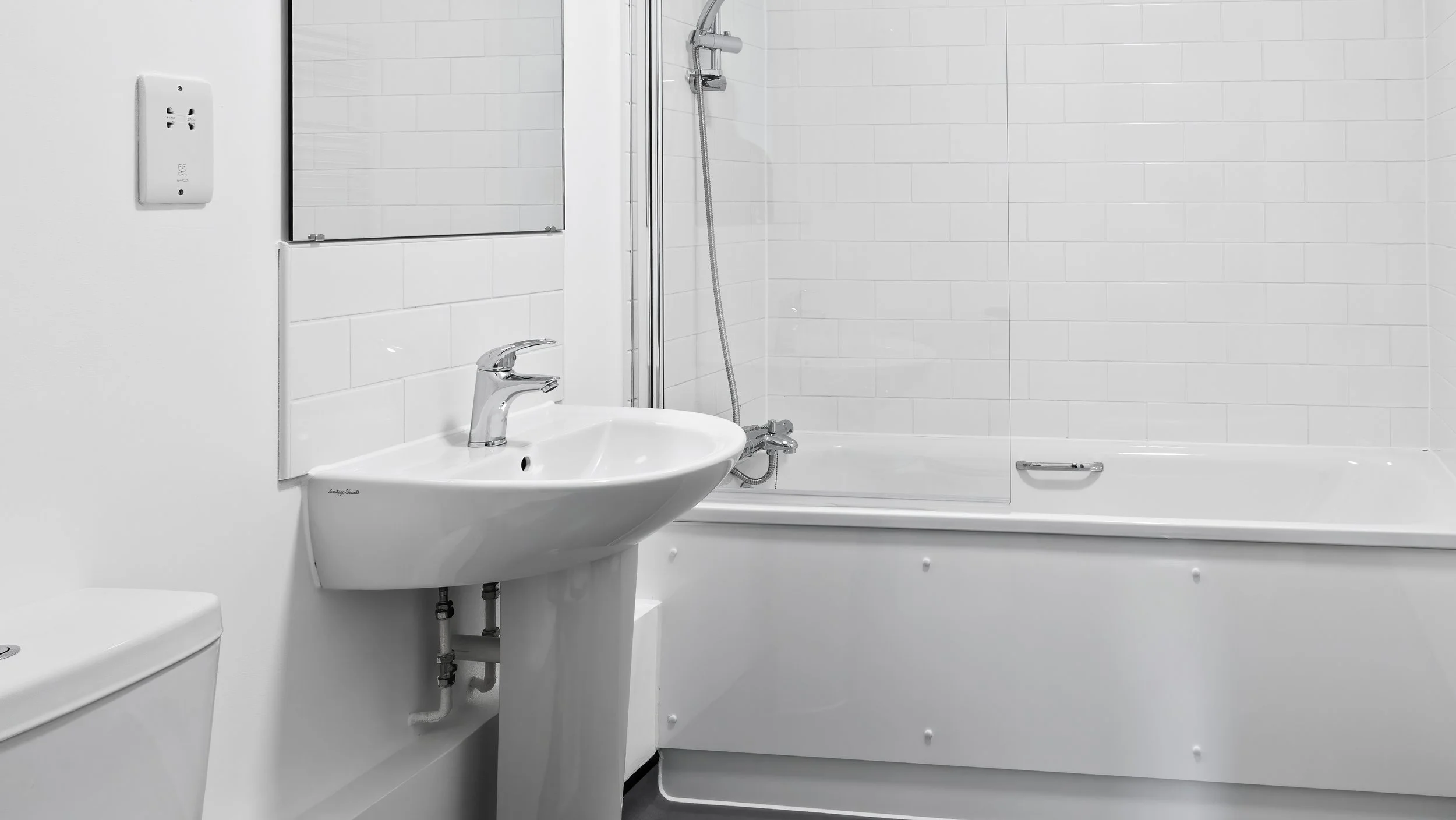 White bathroom inside an Ivy Church Lane apartment