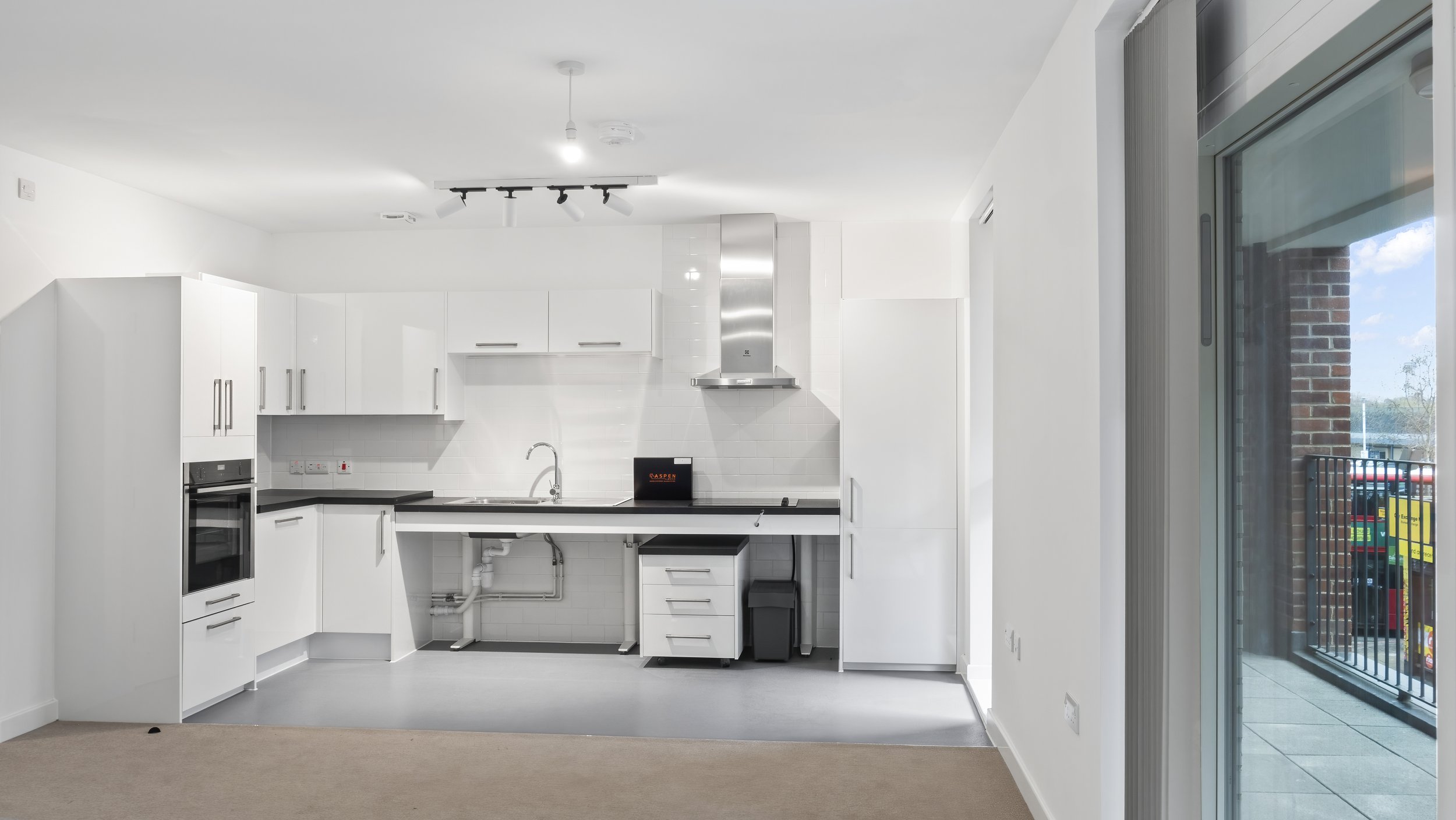 Open-plan kitchen and living area at Ivy Church Lane