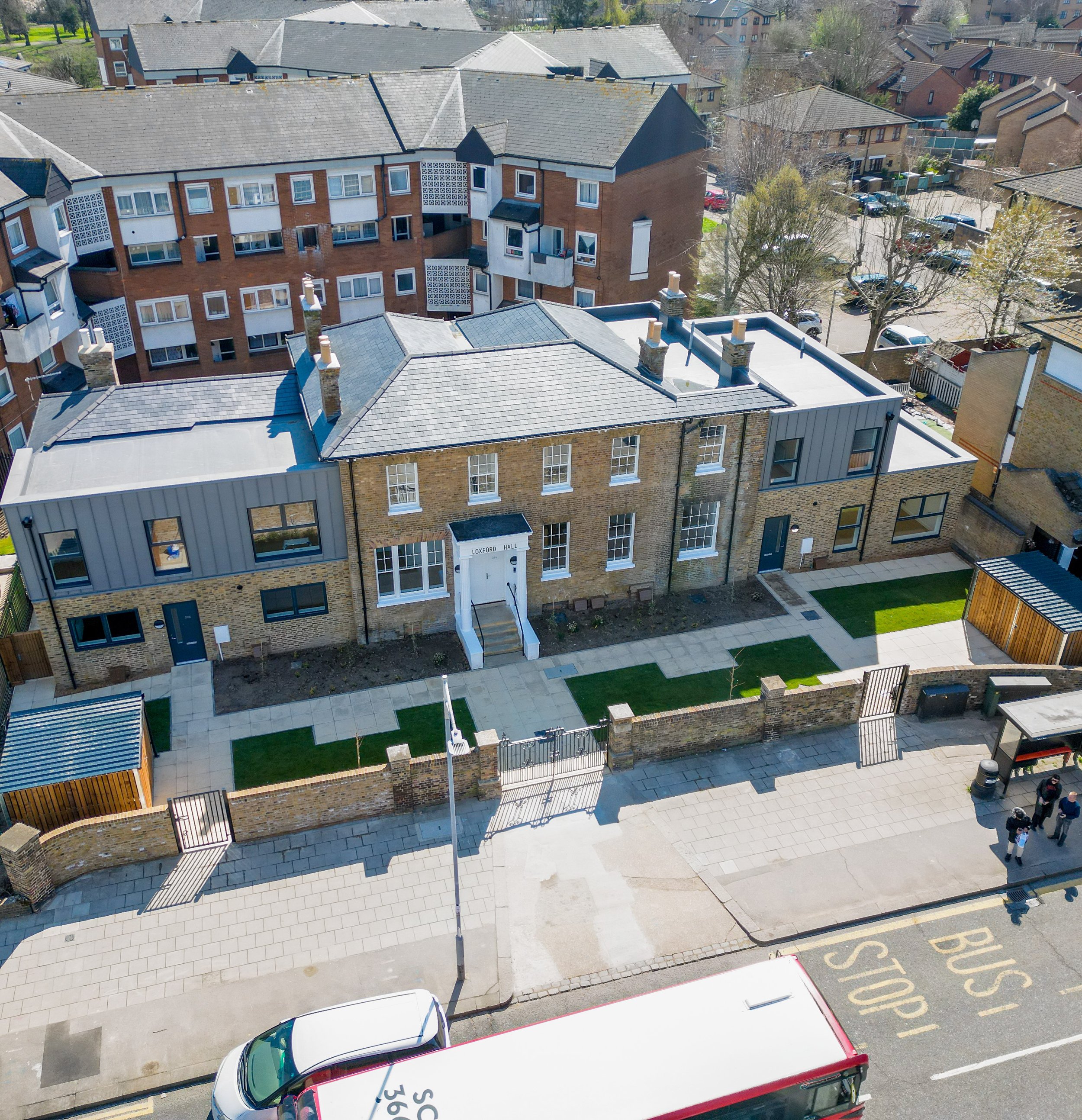 Aerial view of restored Loxford Hall and its surrounding homes