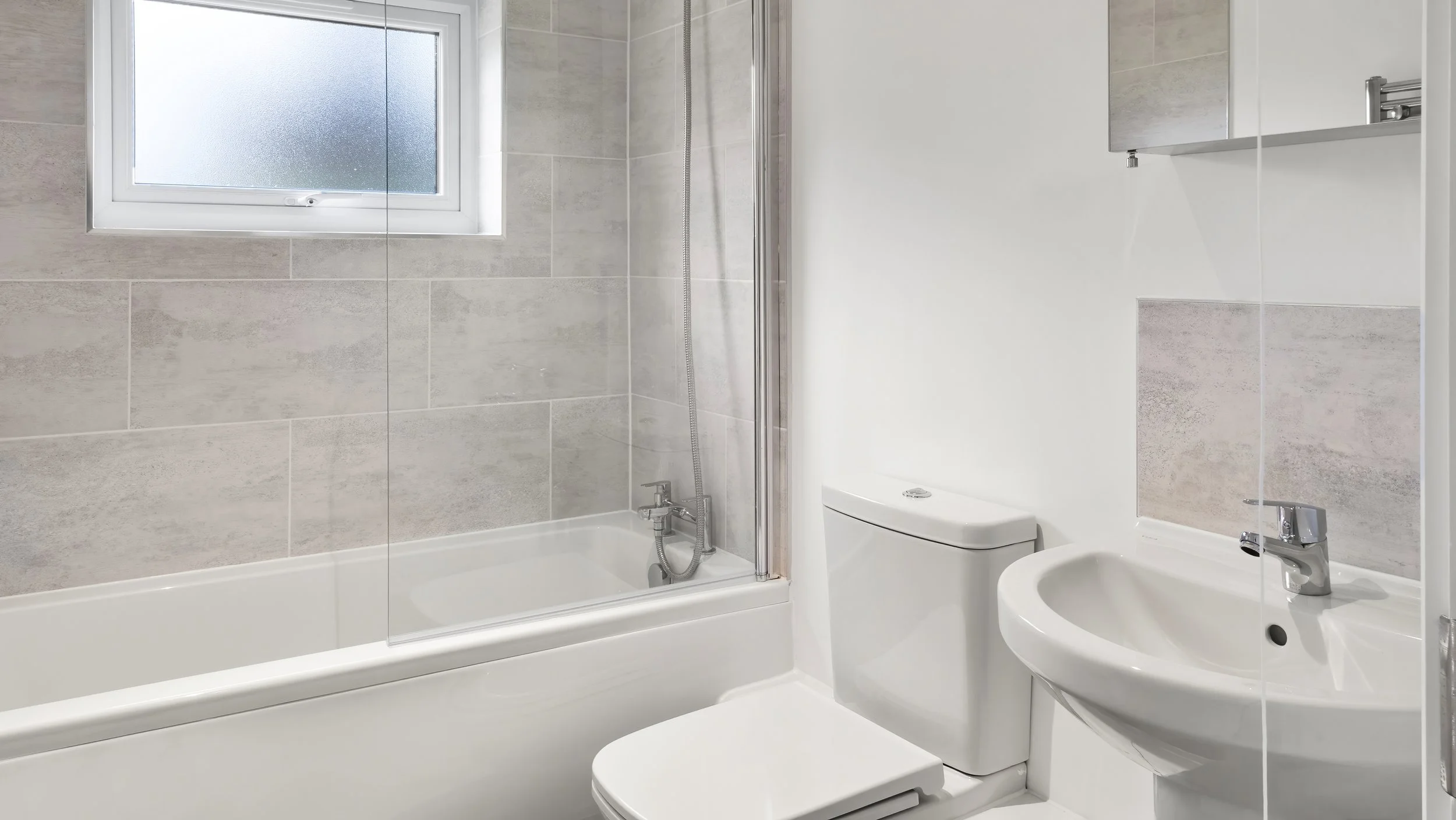 Modern white bathroom inside Wamil Court